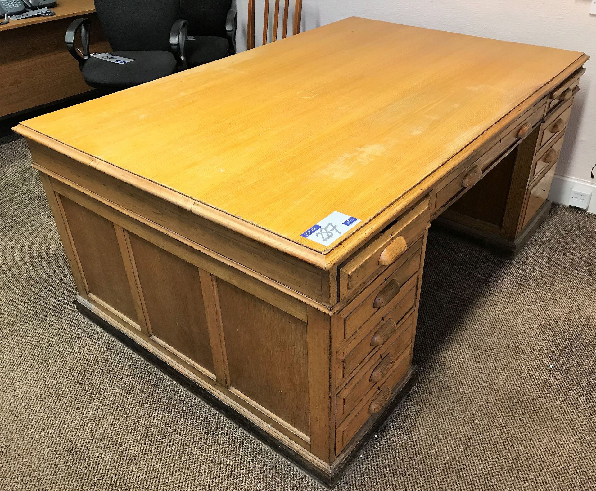 An Oak Veneer Partners Style Desk with 10 drawers,