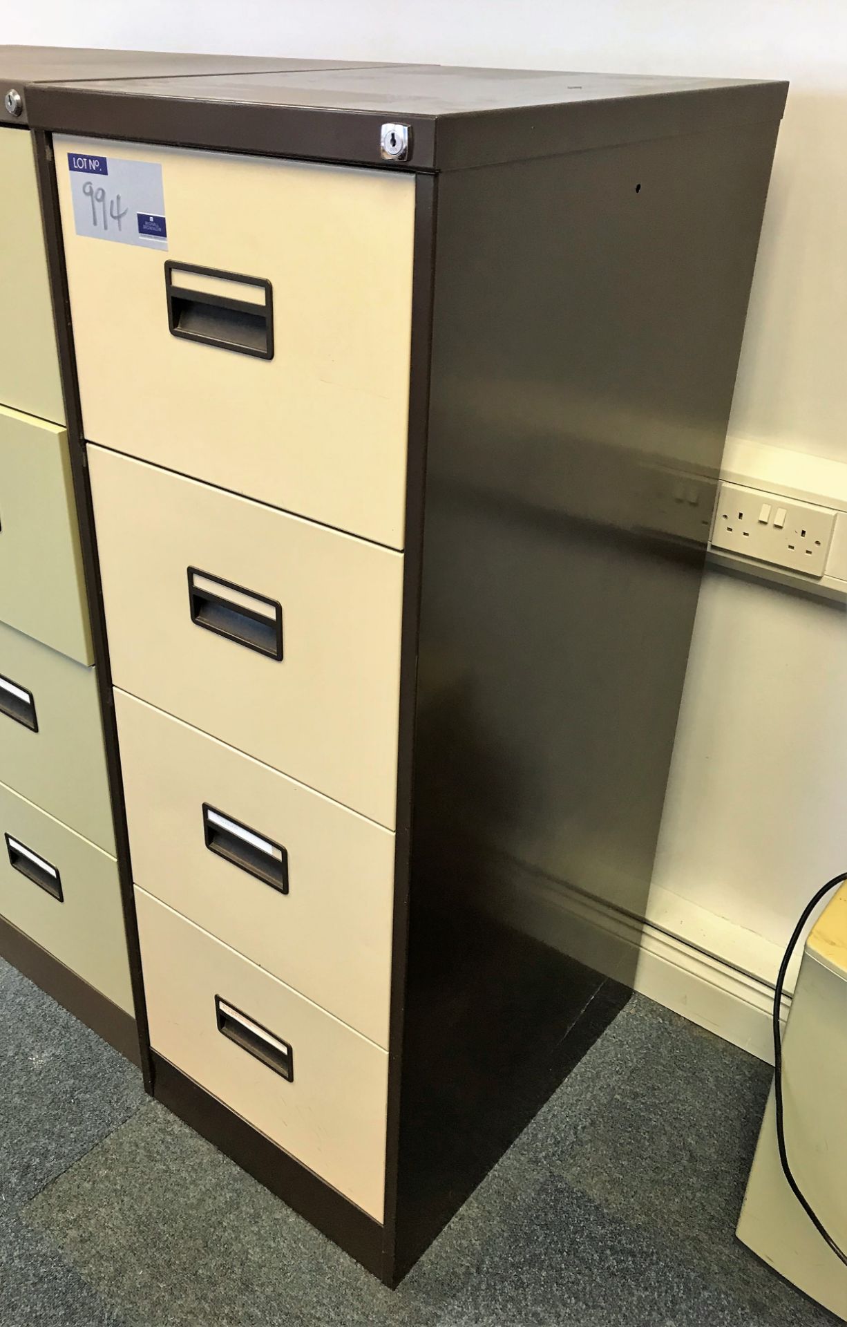 A 4 drawer Filing Cabinet.