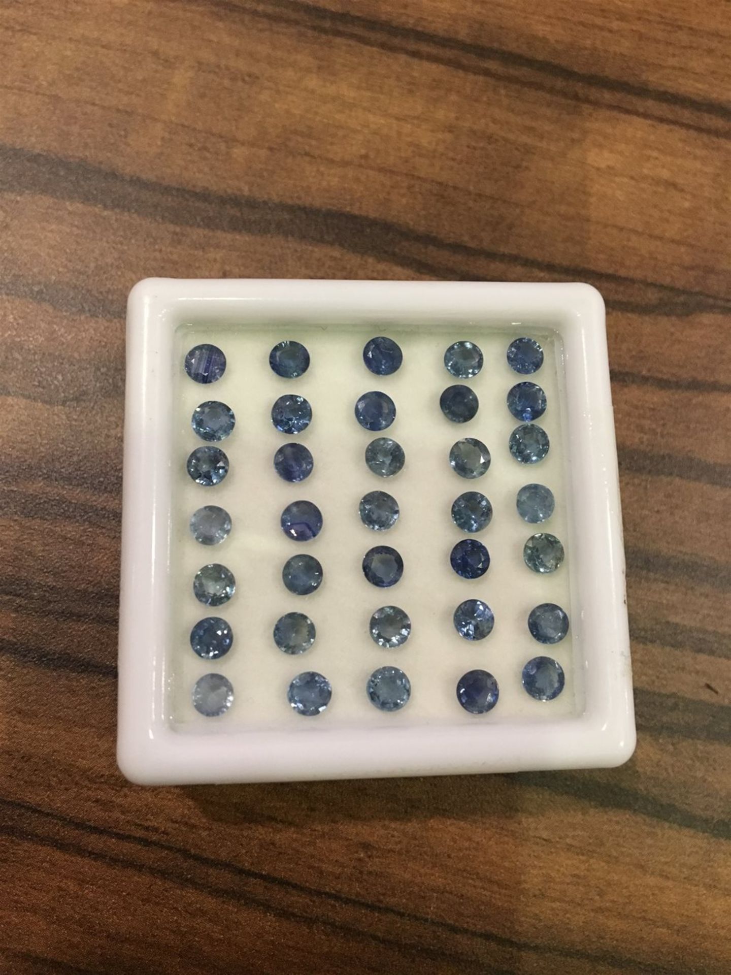 35 Natural Blue Sapphire gemstones.
