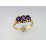 A "Restored" 3 Stone Amethyst Ring