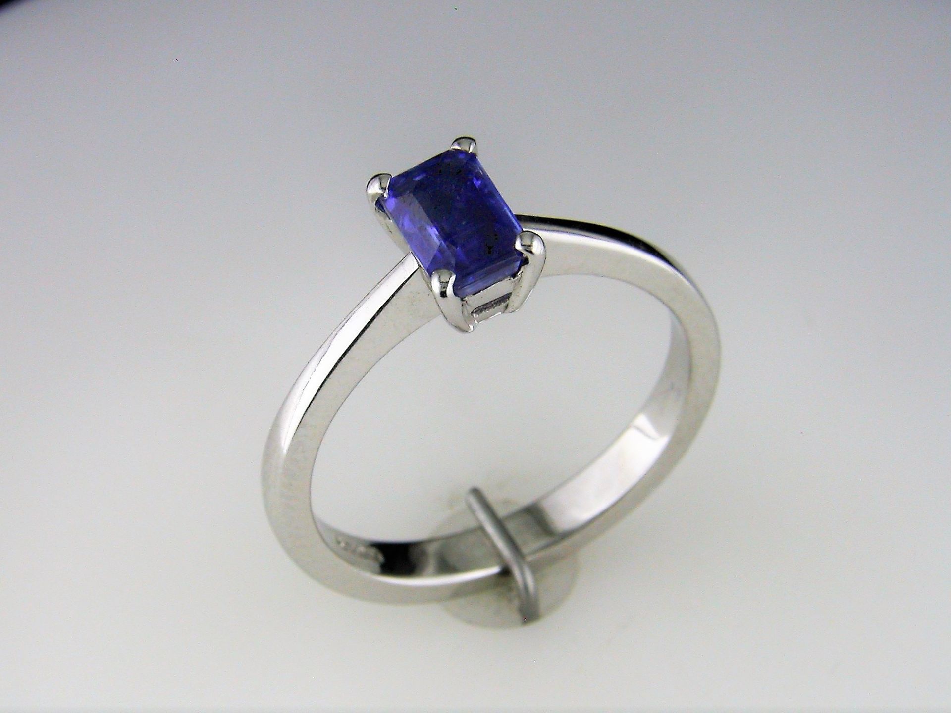 A Solitaire Ring set with a Kyanite Gemstone in an Emerald Cut