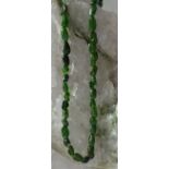 Strand of 60 cts Chrome Diopside nuggets 5/4 to 9/6 mm rare from Russia collectors