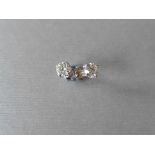 0.66ct Solitaire diamond stud earrings set with brilliant cut diamonds, SI2 clarity and I colour.