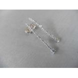 0.60ct diamond drop earrings set in 18ct white gold. Claw setting. Brilliant cut diamonds, H