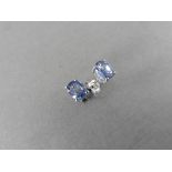 0.60ct ceylon sapphire stud style earrings set in 9ct white gold. 5 x 4mm oval cut sapphires set