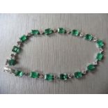 6ct emerald and diamond bracelet.Set with emerald cut ( treated ) emeralds and small brilliant cut