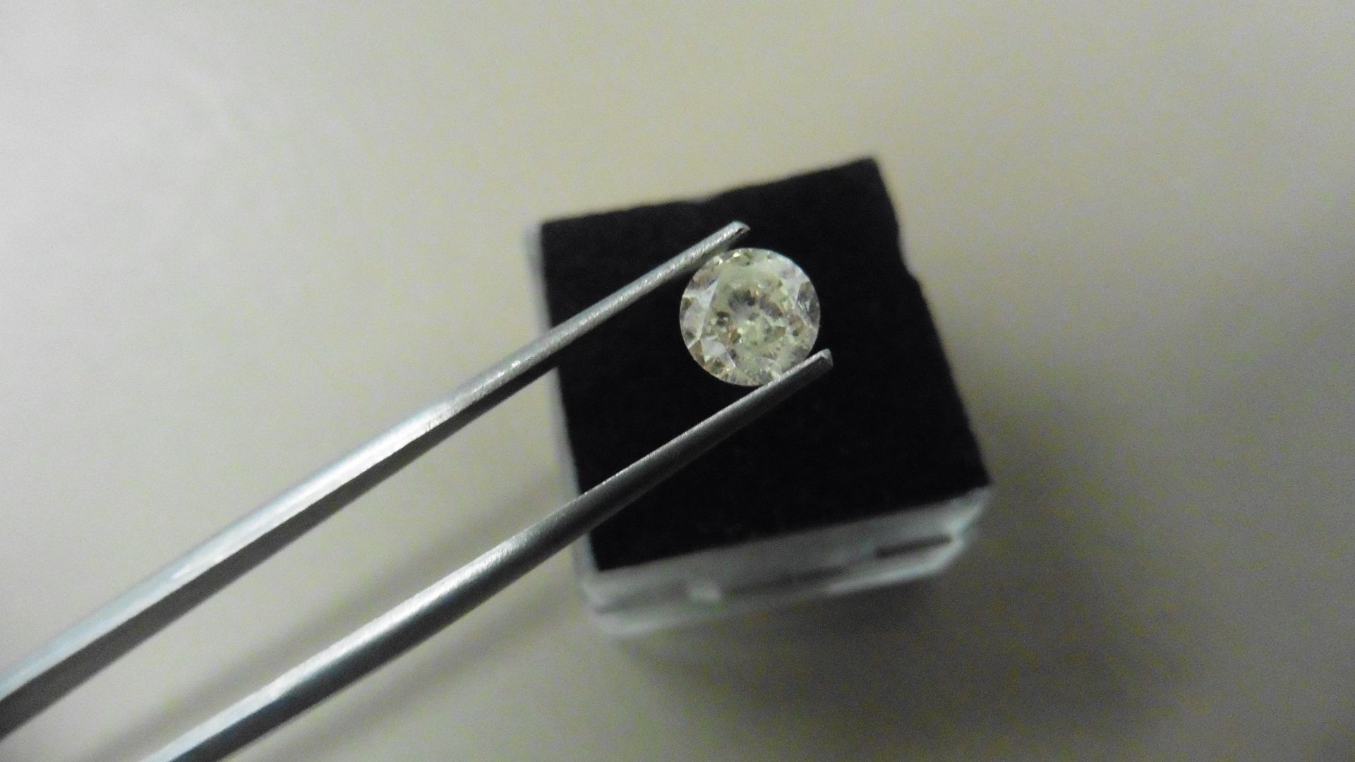 1.09ct Brilliant Cut Diamond, Enhanced stone. H colour, I2 clarity. 6.42 x 3.95mm. Valued at £