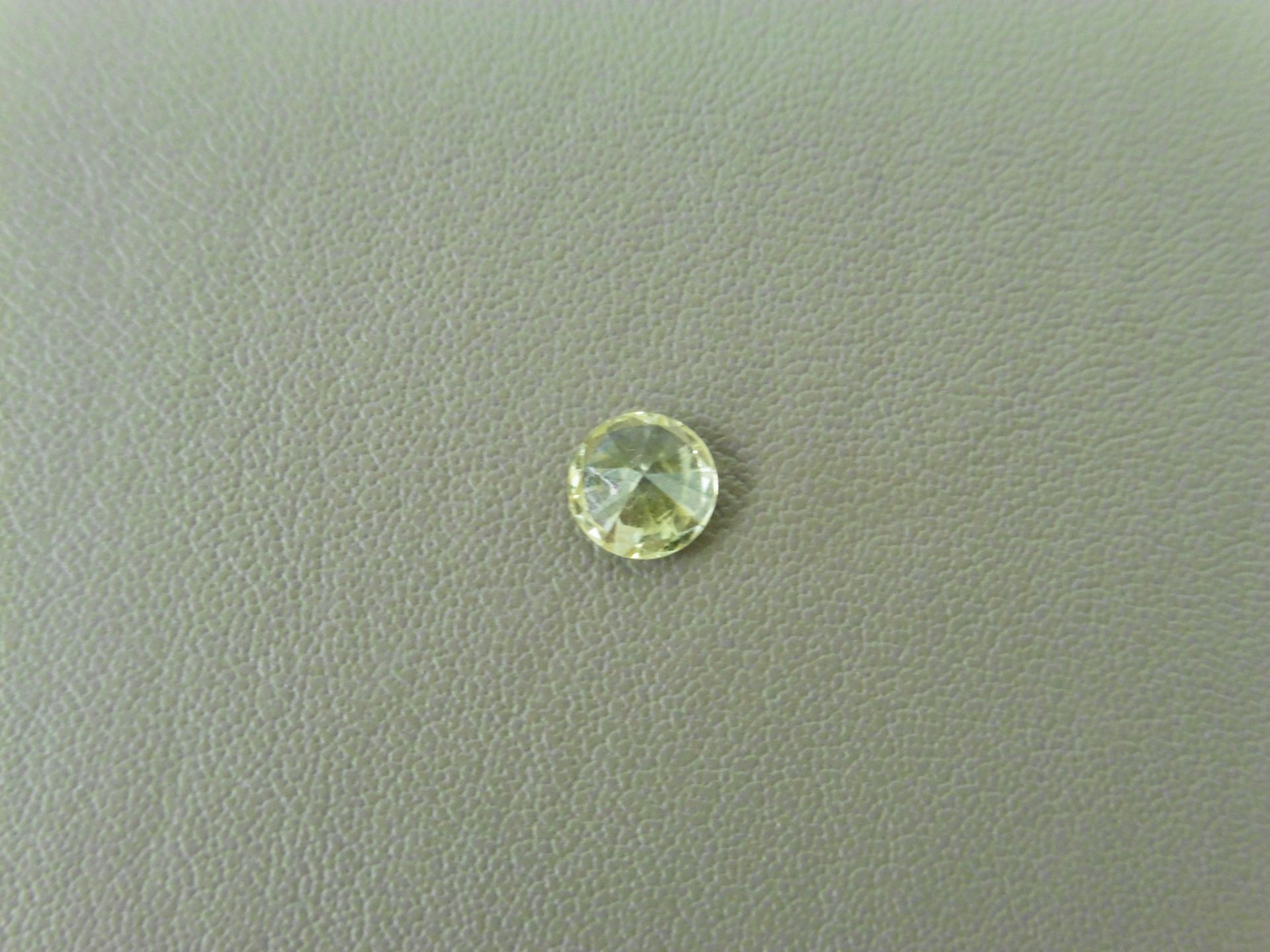 0.51ct brilliant cut diamond. Fancy yellow colour, SI2 clarity. AGI Certificate Ð 975781. Valued - Image 2 of 4