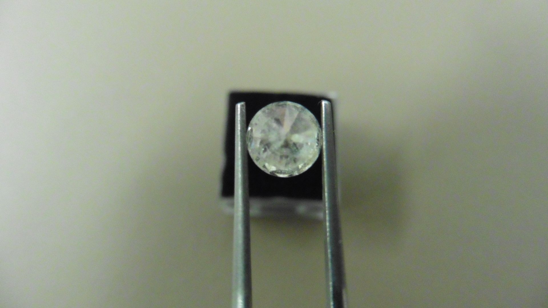 1.03ct Brilliant Cut Diamond, Enhanced stone. I colour, I2 clarity. 6.58 x 3.75mm. Valued at £ - Image 2 of 4