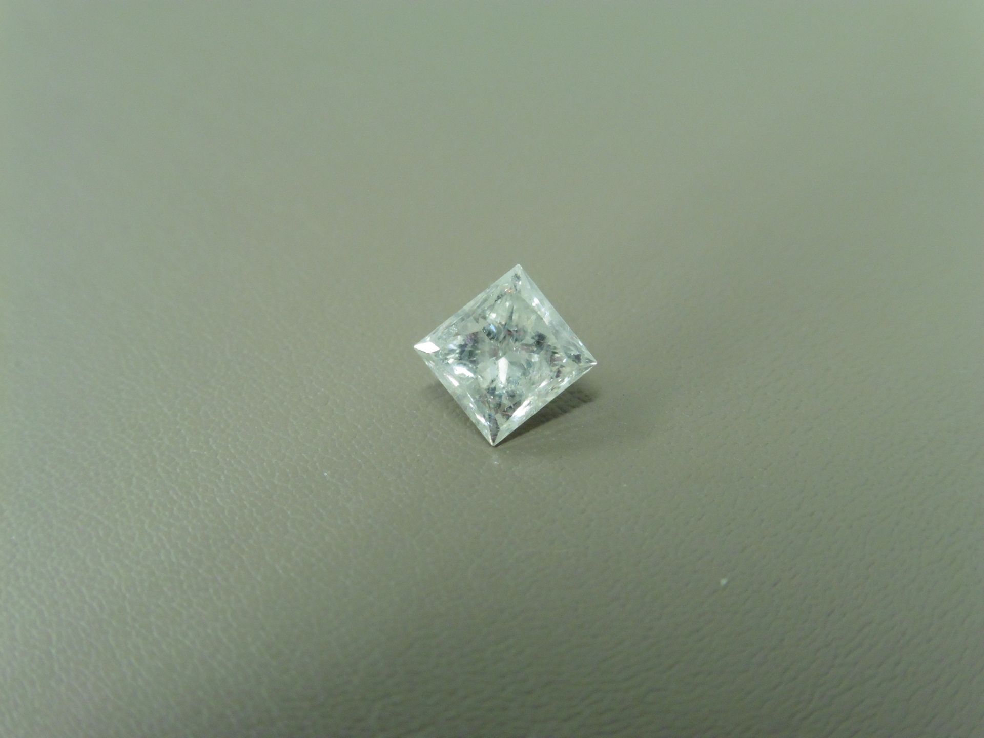 1.09ct enhanced princess cut diamond. G colour and I2 clarity. No certification but can be done