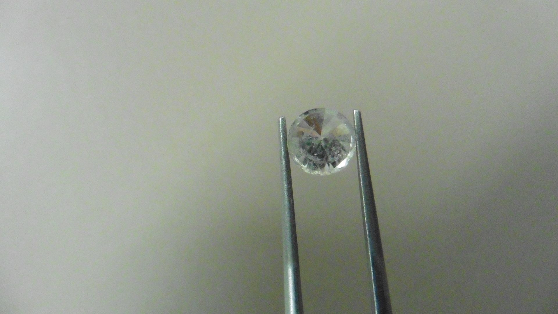 1.73ct Brilliant Cut Diamond, Enhanced stone. G/H colour, I1-2 clarity. 7.32 x 4.77mm. Valued at £ - Image 2 of 4