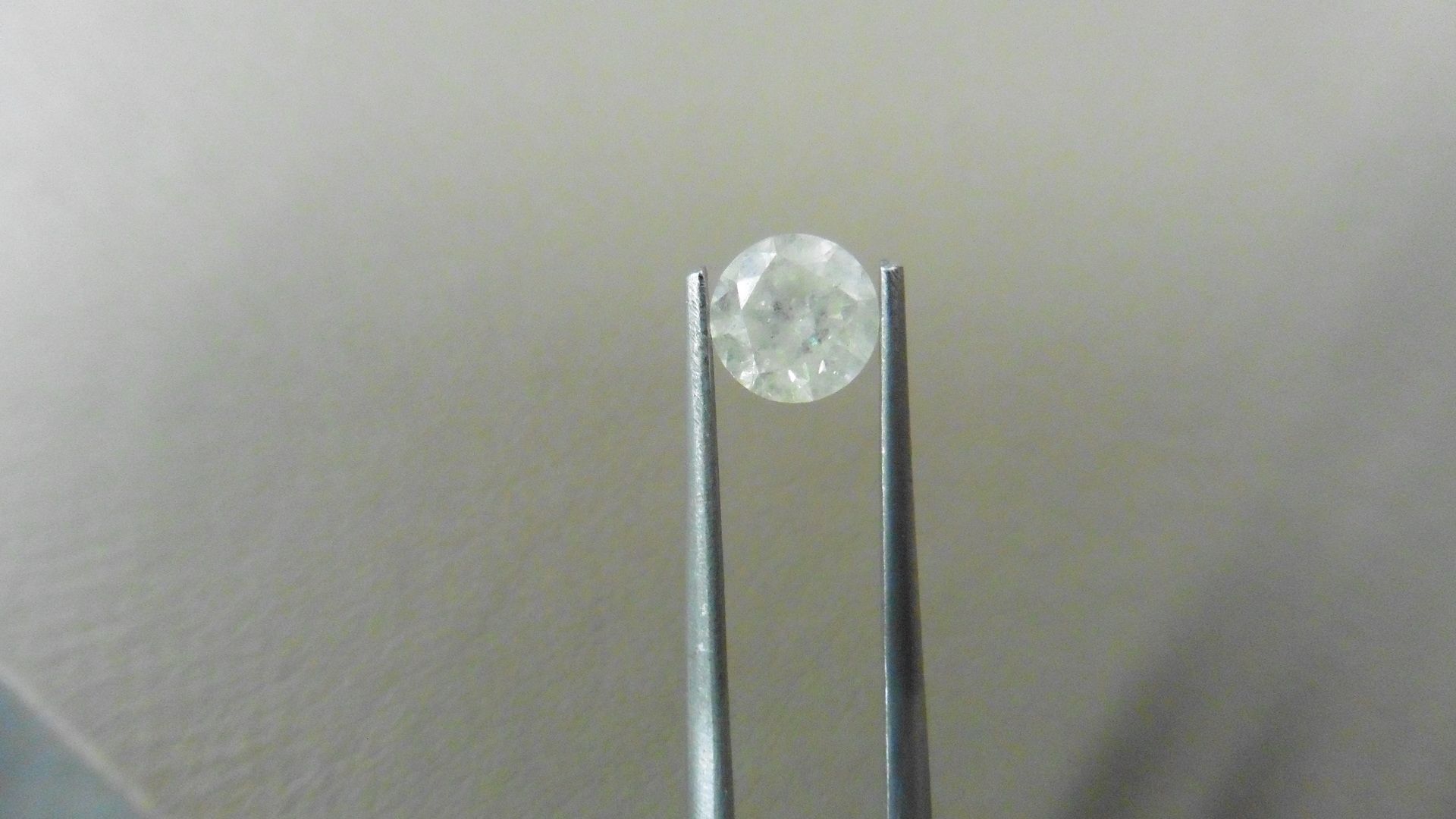 1.01ct Brilliant Cut Diamond, Enhanced stone.H colour, I2 clarity. 6.15 x 4mm. Valued at £1490. No
