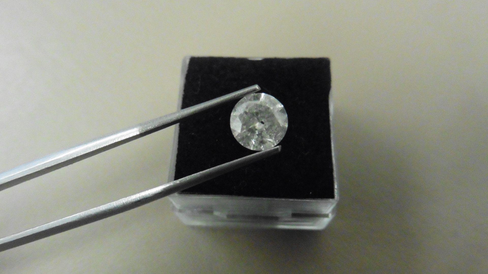 1.32ct Brilliant Cut Diamond, Enhanced stone. H colour, I2 clarity. 7.20 x 4.17mm. Valued at £