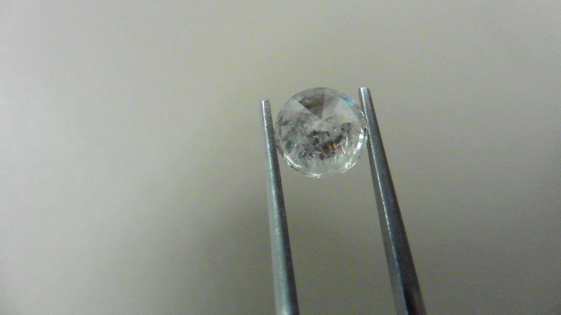 1.55ct Brilliant Cut Diamond, Enhanced stone. H colour, P1-2 clarity. 7.07 x 4.73mm. Valued at £ - Image 2 of 5