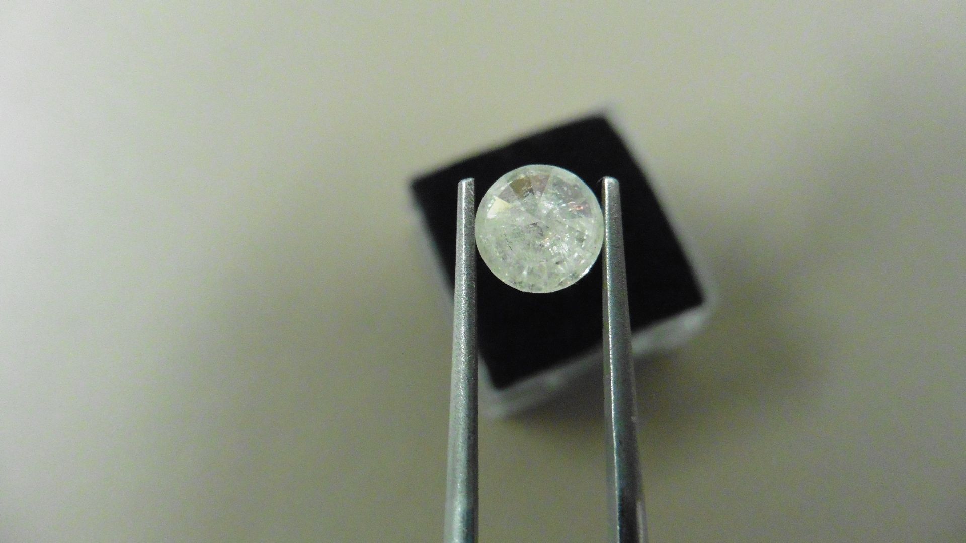 1.04ct Brilliant Cut Diamond, Enhanced stone. I colour, I2 clarity. 6.49 x 3.85mm. Valued at £ - Image 2 of 4