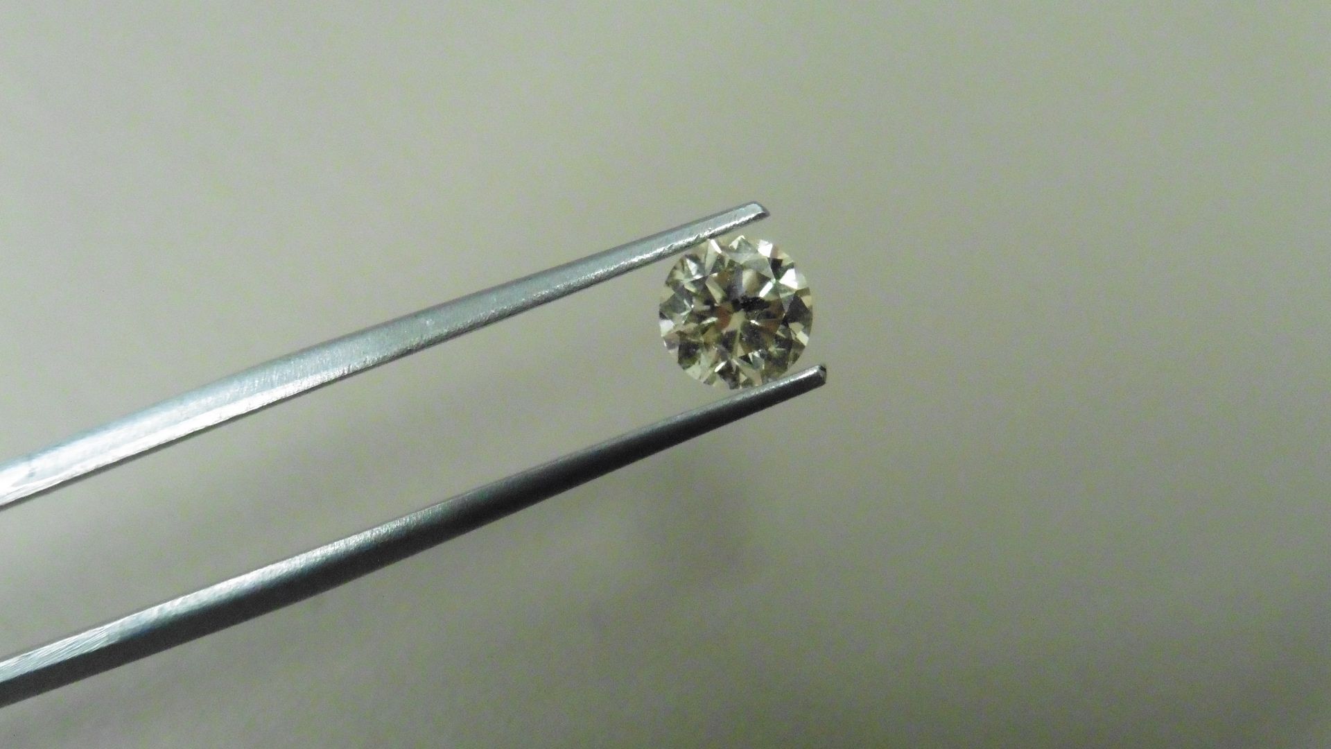 0.92ct natural loose brilliant cut diamond. K colour and I2 clarity. 5.98 x 3.96mm.No
