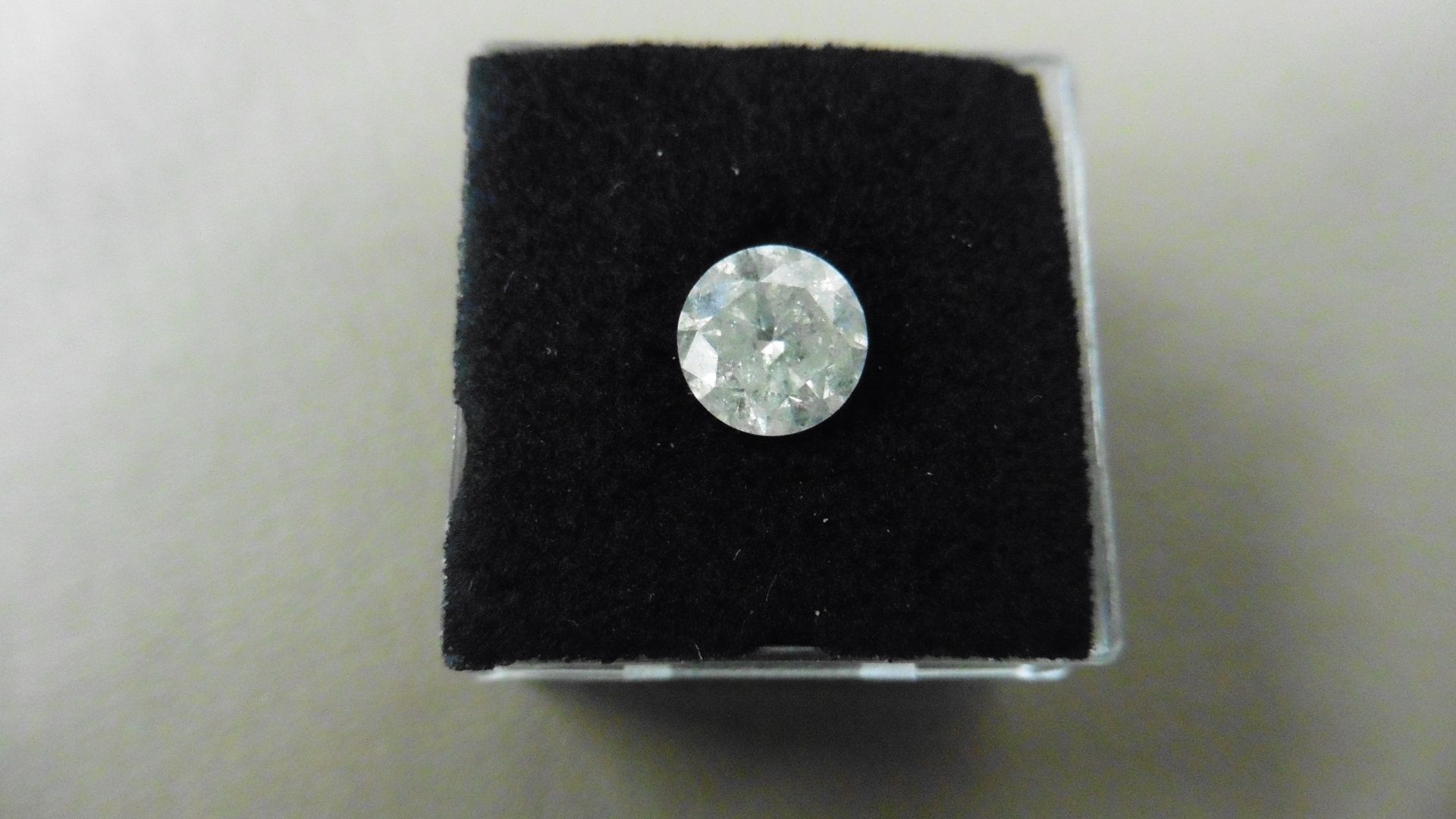 1.73ct Brilliant Cut Diamond, Enhanced stone. G/H colour, I1-2 clarity. 7.32 x 4.77mm. Valued at £ - Image 4 of 4