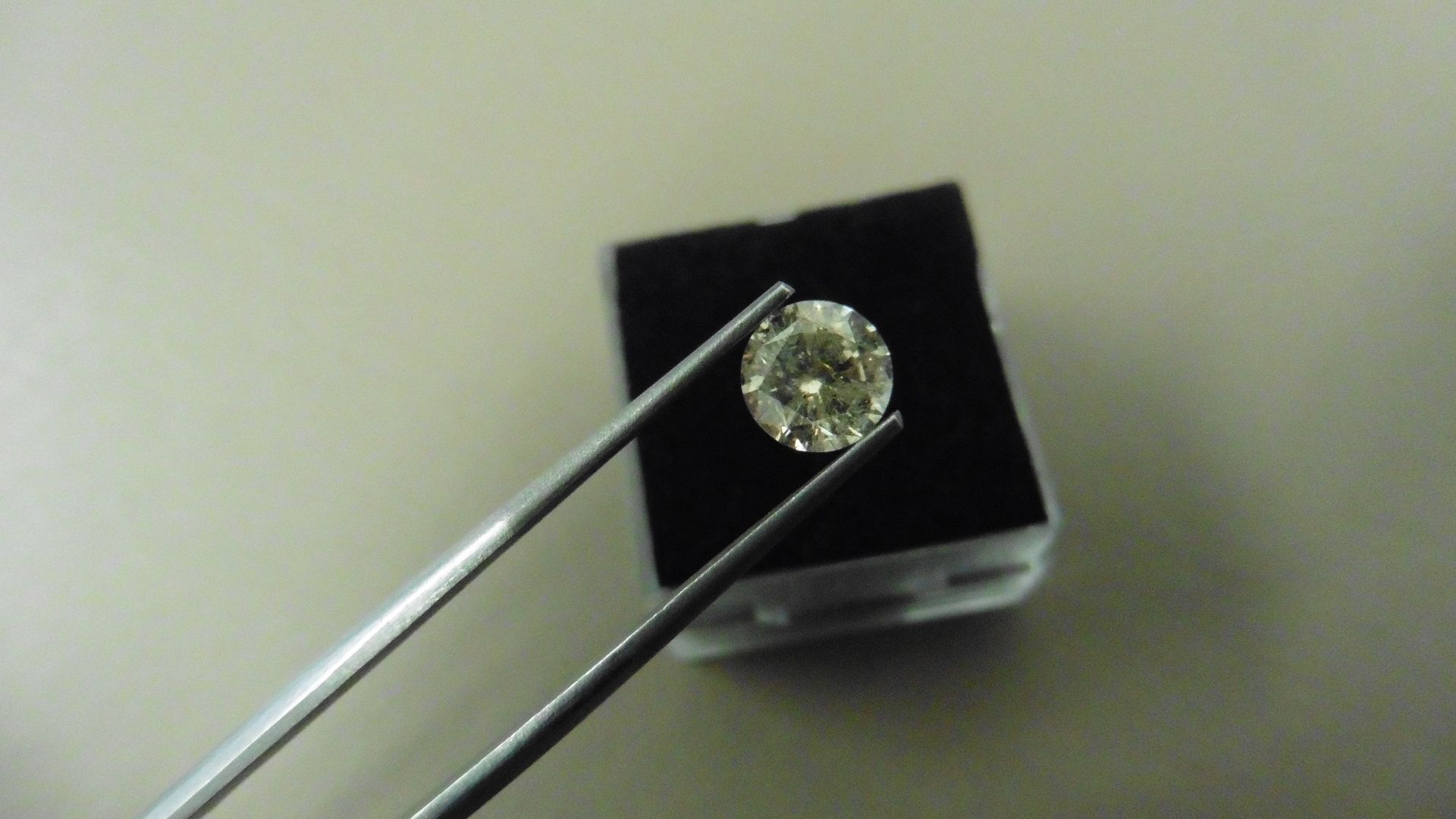 1.12ct Brilliant Cut Diamond, Enhanced stone. K colour, I1 clarity. 6.72 x 3.90mm. Valued at £