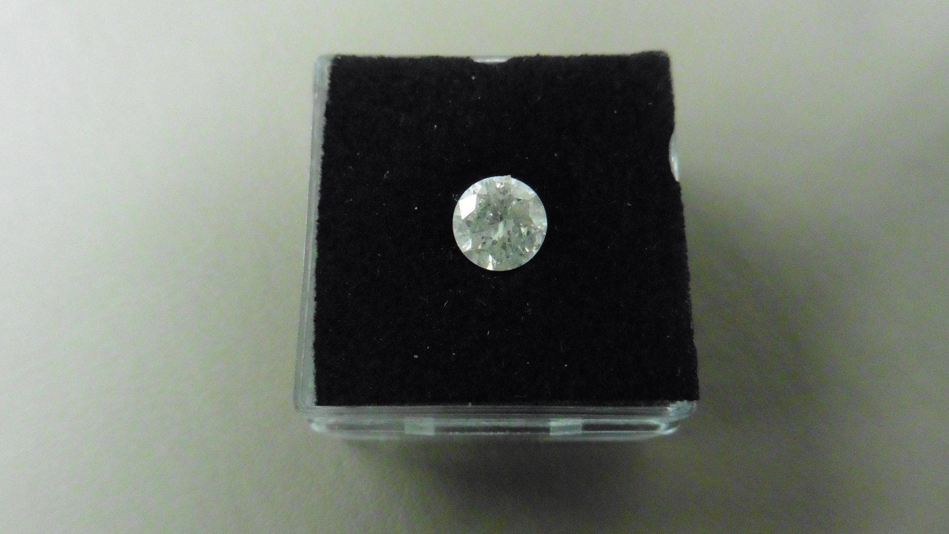 1.02ct Brilliant Cut Diamond, Enhanced stone. I colour, I2 clarity. 6.34 x 3.93mm. Valued at £ - Image 4 of 4