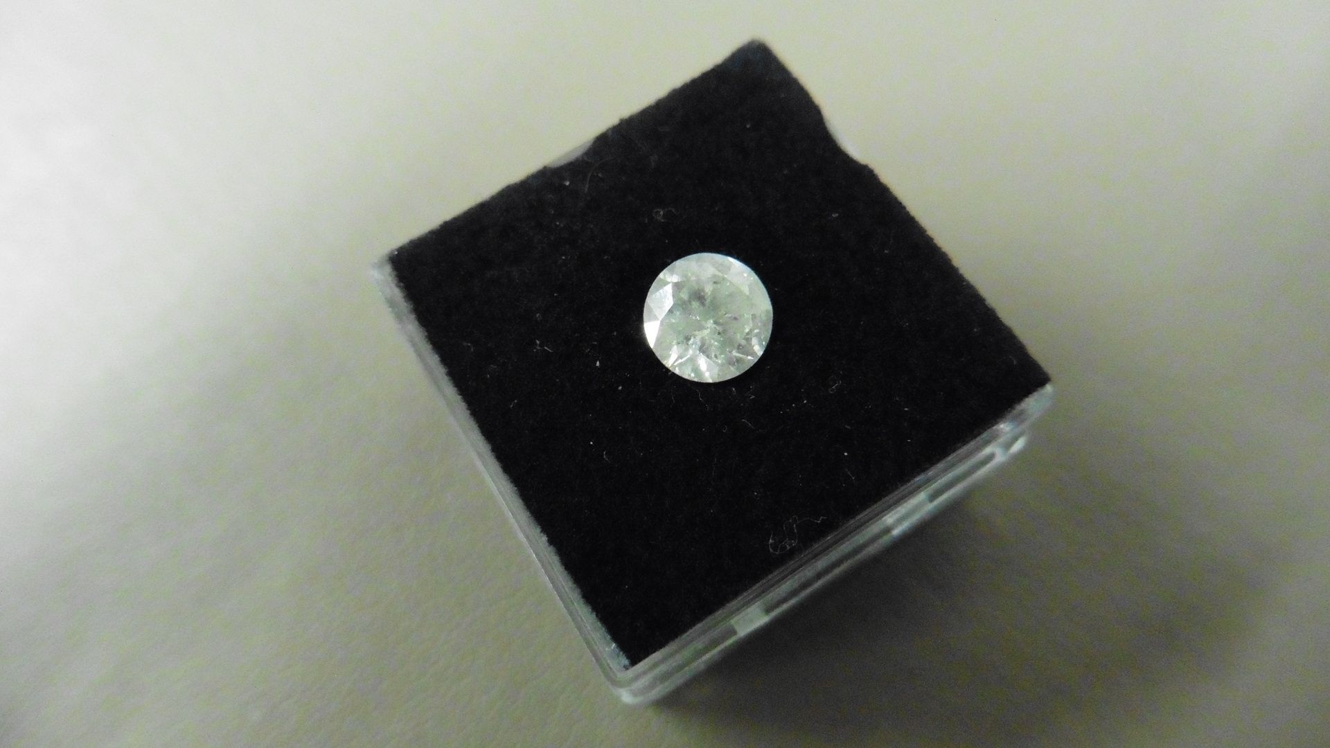 1.04ct Brilliant Cut Diamond, Enhanced stone. I colour, I2 clarity. 6.49 x 3.85mm. Valued at £ - Image 4 of 4