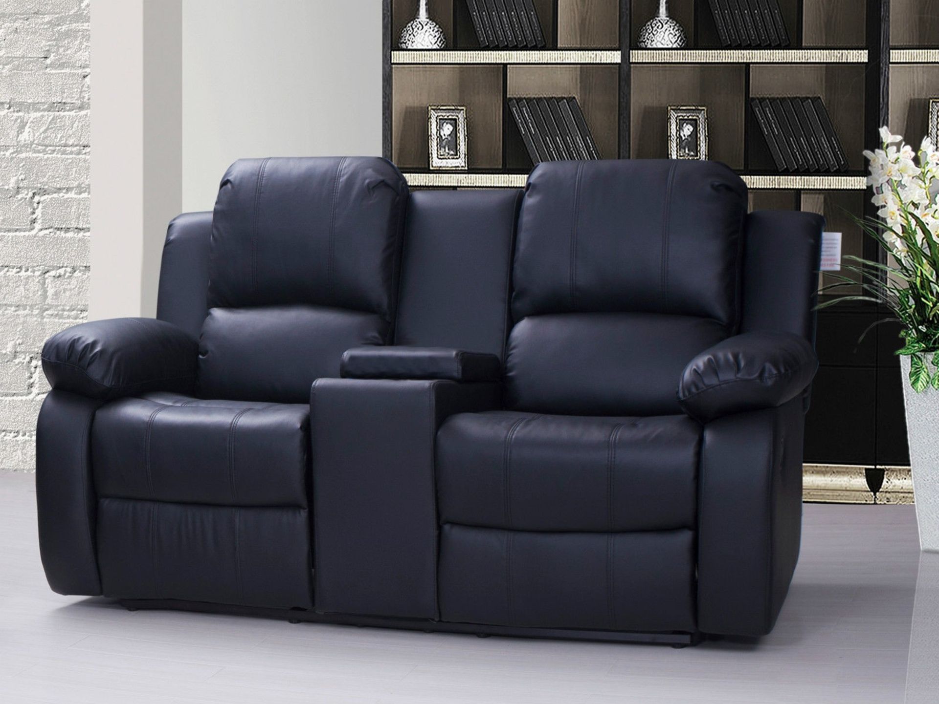 Brand New 2 Seater Manhattan Manual Reclining Sofa With Console And Drinks Holder In Black Leather