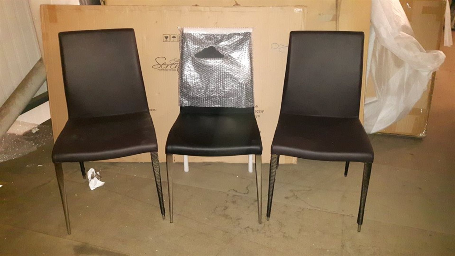 3 Black faux leather dining chairs with chrome legs
