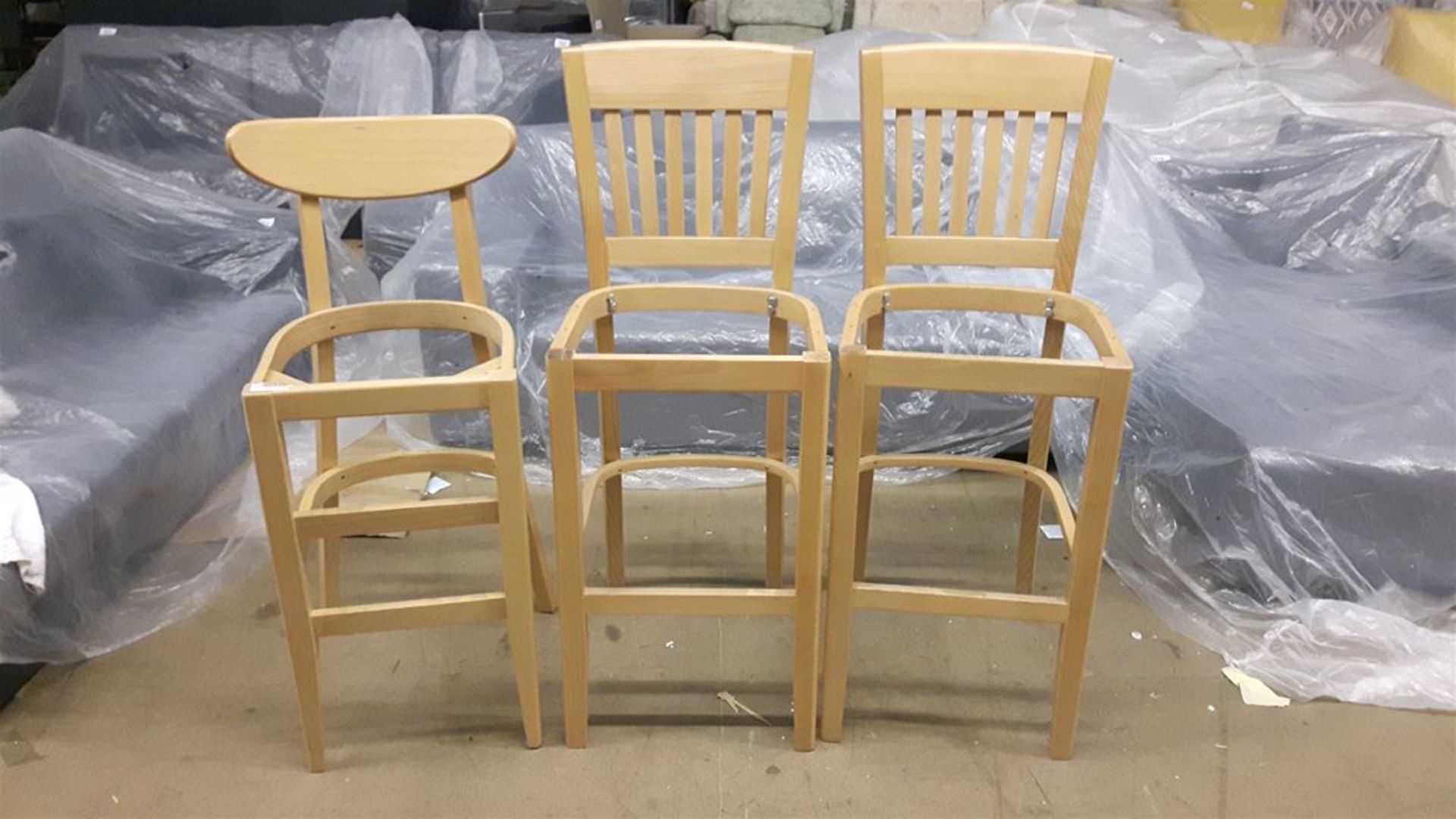 3 New old stock bar stools without seat pads.