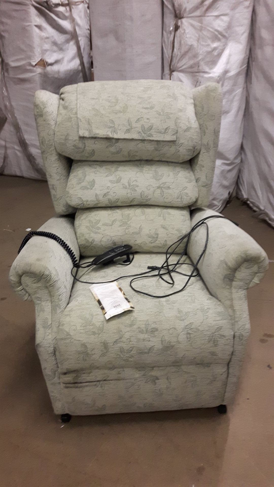 DSL Electric powered high back armchair for spares or repair.