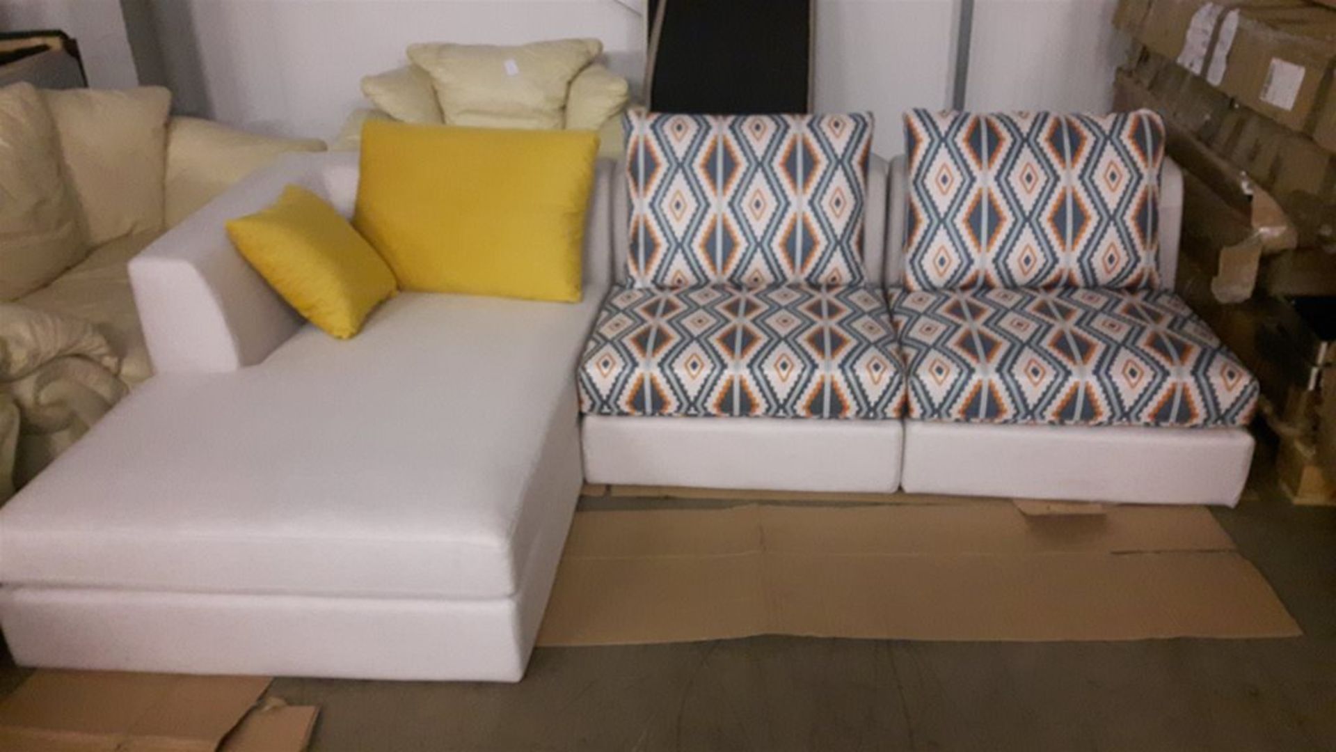 Funky sofa with chaise longue cream and yellow.