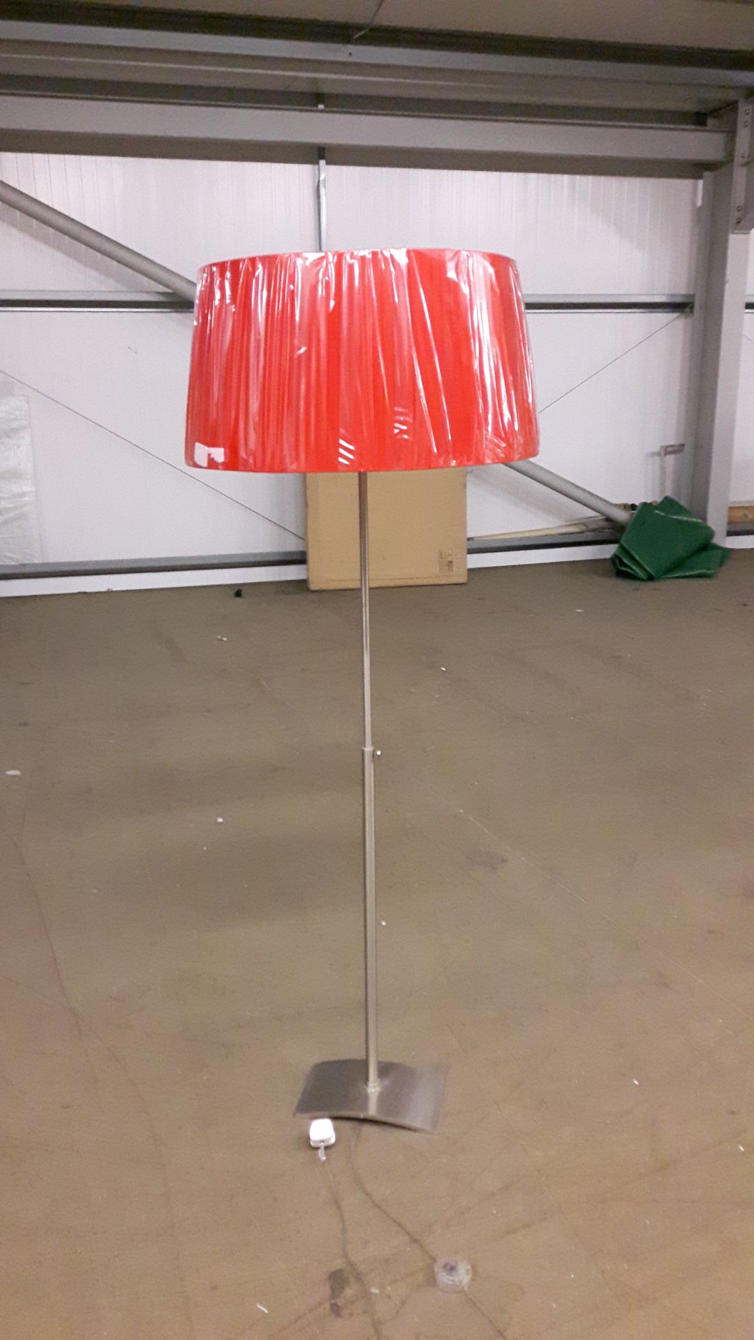 Adjustable stainless steel Floor Lamp with new red shade.