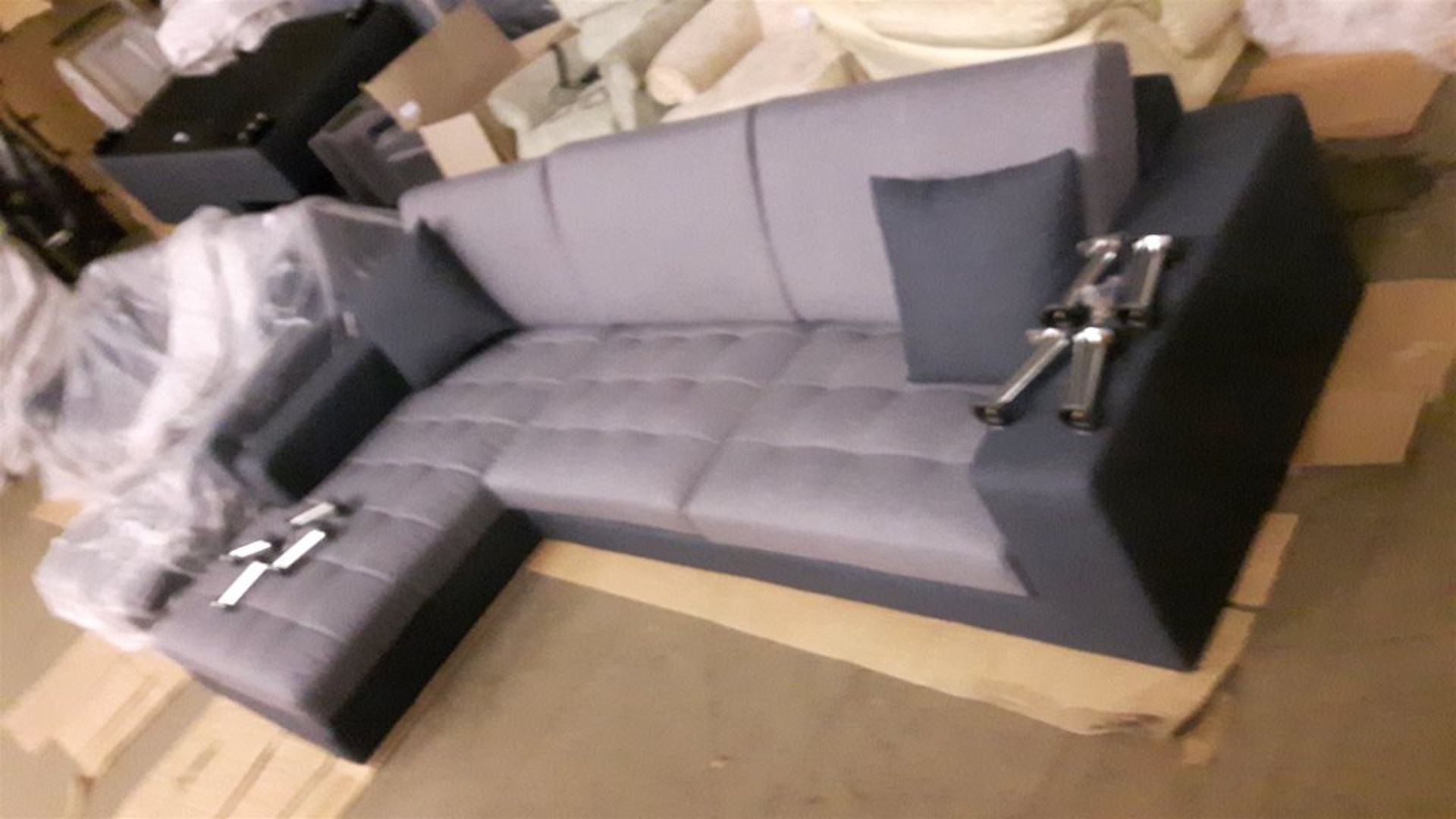 Penbury Grey mix sofa and chaise longue set with chrome legs.
