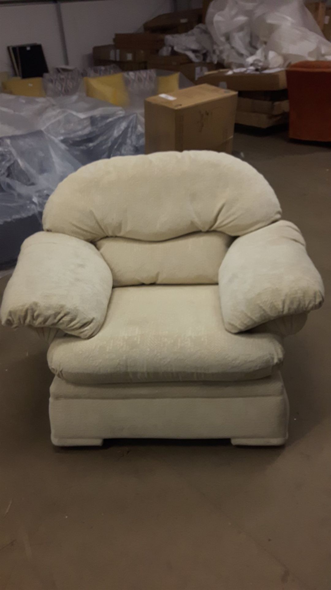 Large ivory armchair.
