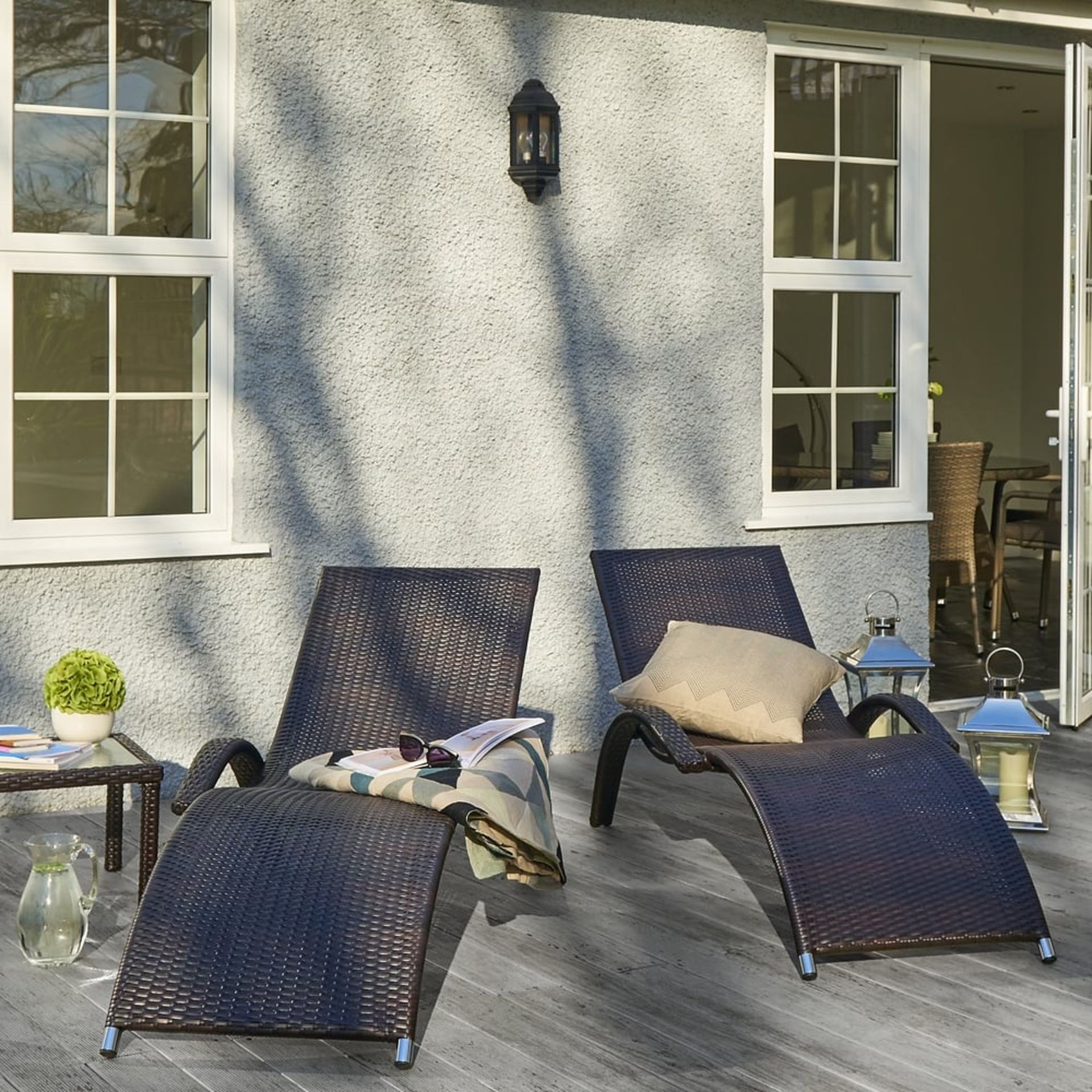 A Pair of Poole Sun loungers and Side Table.