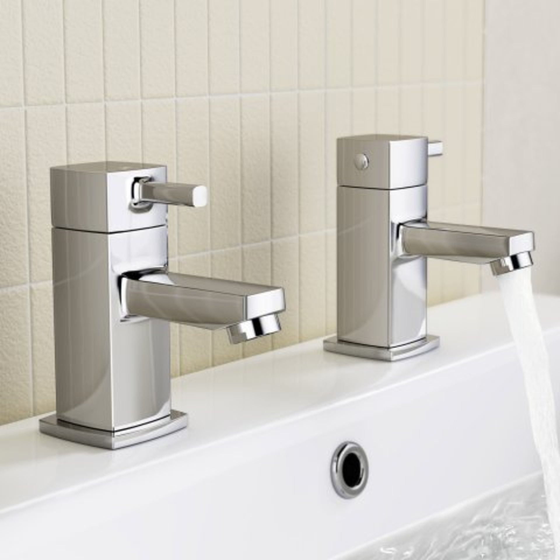 (H37) Ivela Hot and Cold Basin Taps Presenting a contemporary design, this solid brass tap has