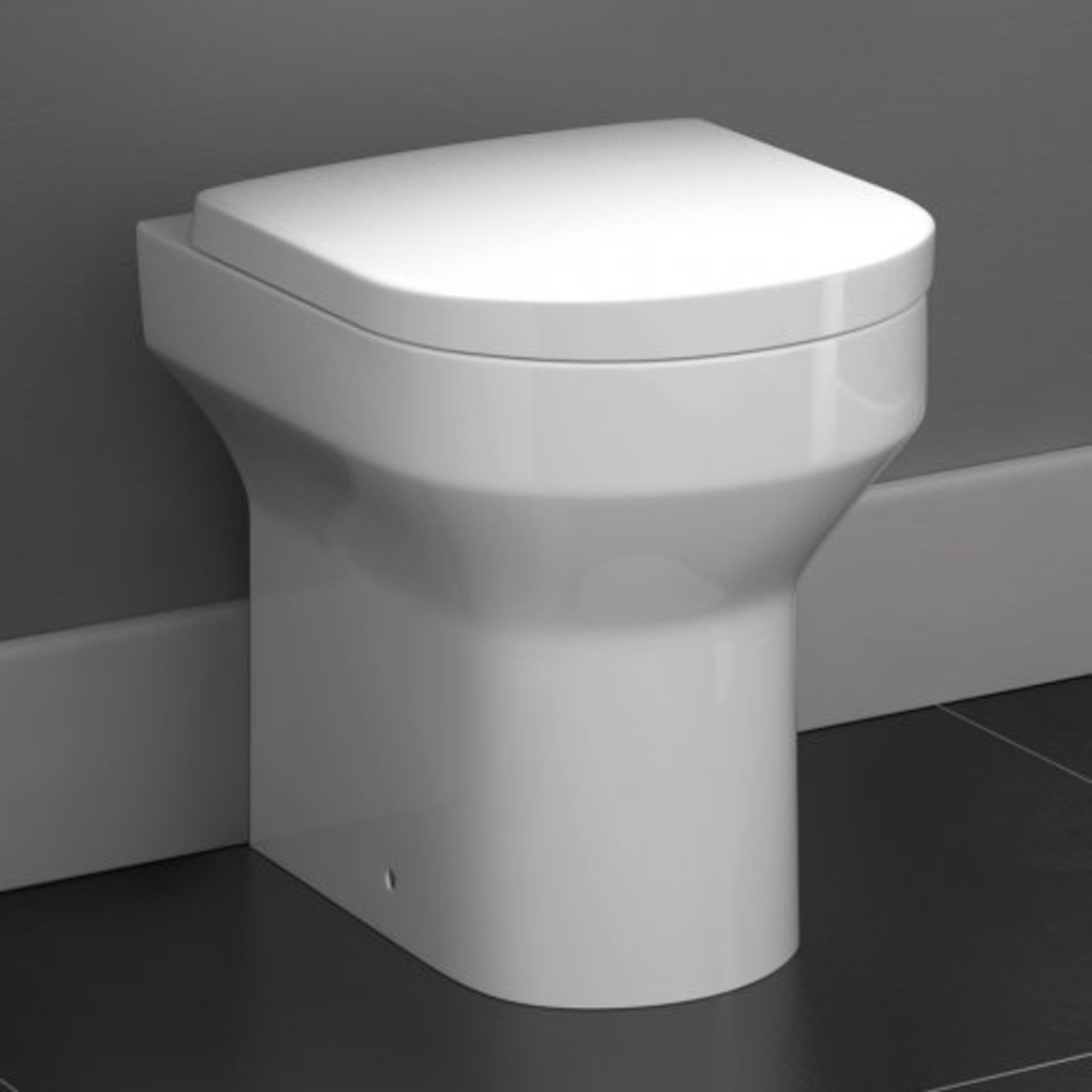 (H69) Cesar III Back to Wall Toilet inc Seat. RRP £349.99. This stylish back to wall toilet looks