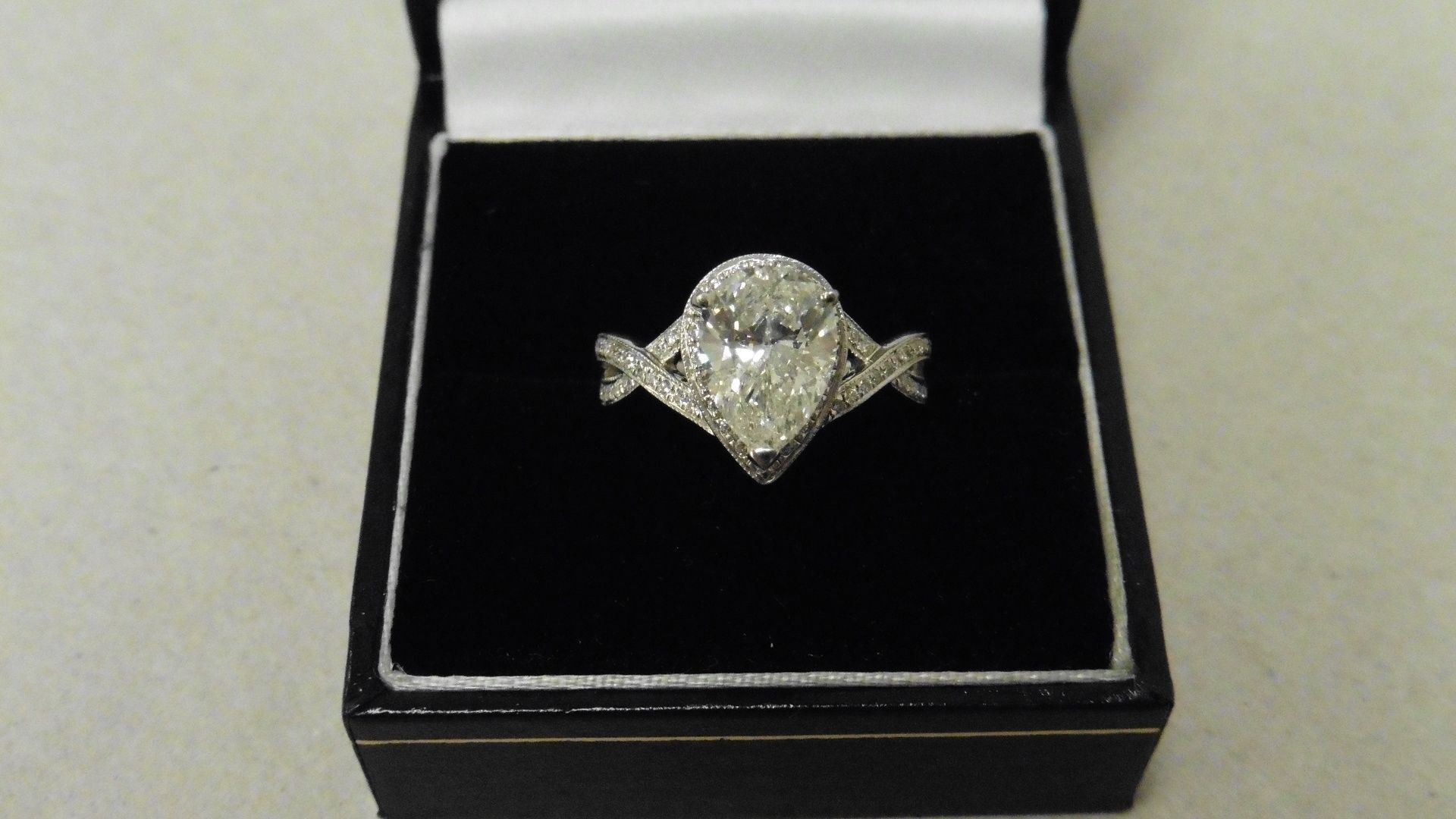 2.03ct pear shaped diamond set solitaire ring. Pear diamond H colour, si2 clarity. Diamond set - Image 5 of 6