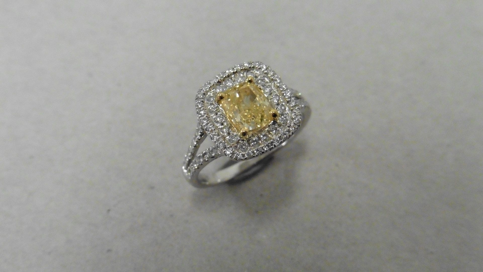 1.13ct diamond set solitaire ring. Yellow cushion cut diamond,Fancy yellow/green, Si1 clarity on GIA