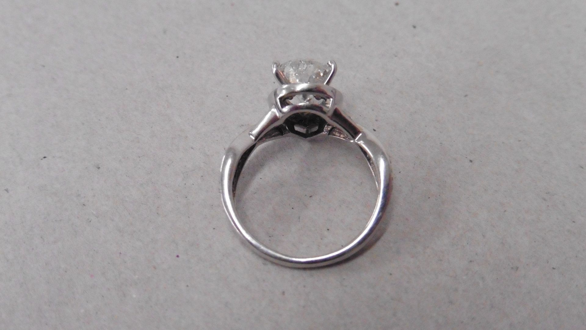 2.03ct pear shaped diamond set solitaire ring. Pear diamond H colour, si2 clarity. Diamond set - Image 2 of 6