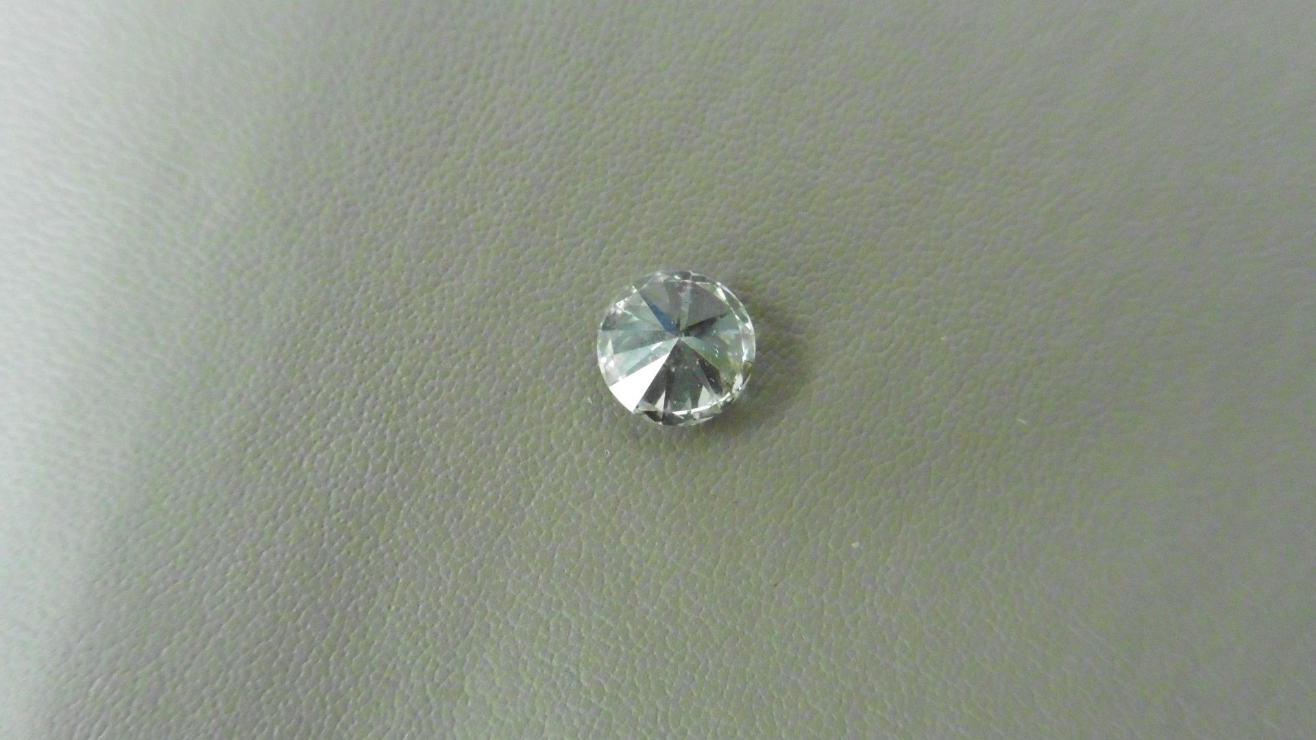0.91ct brilliant cut diamond, loose stone.J colour and I1 clarity. 5.91 x 6 x 3.96mm. IGI - Image 3 of 5