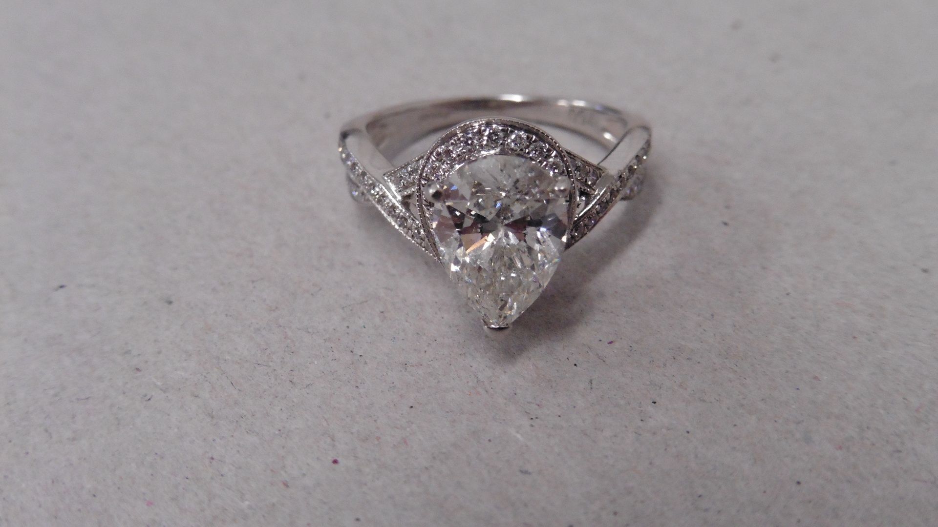 2.03ct pear shaped diamond set solitaire ring. Pear diamond H colour, si2 clarity. Diamond set - Image 4 of 6