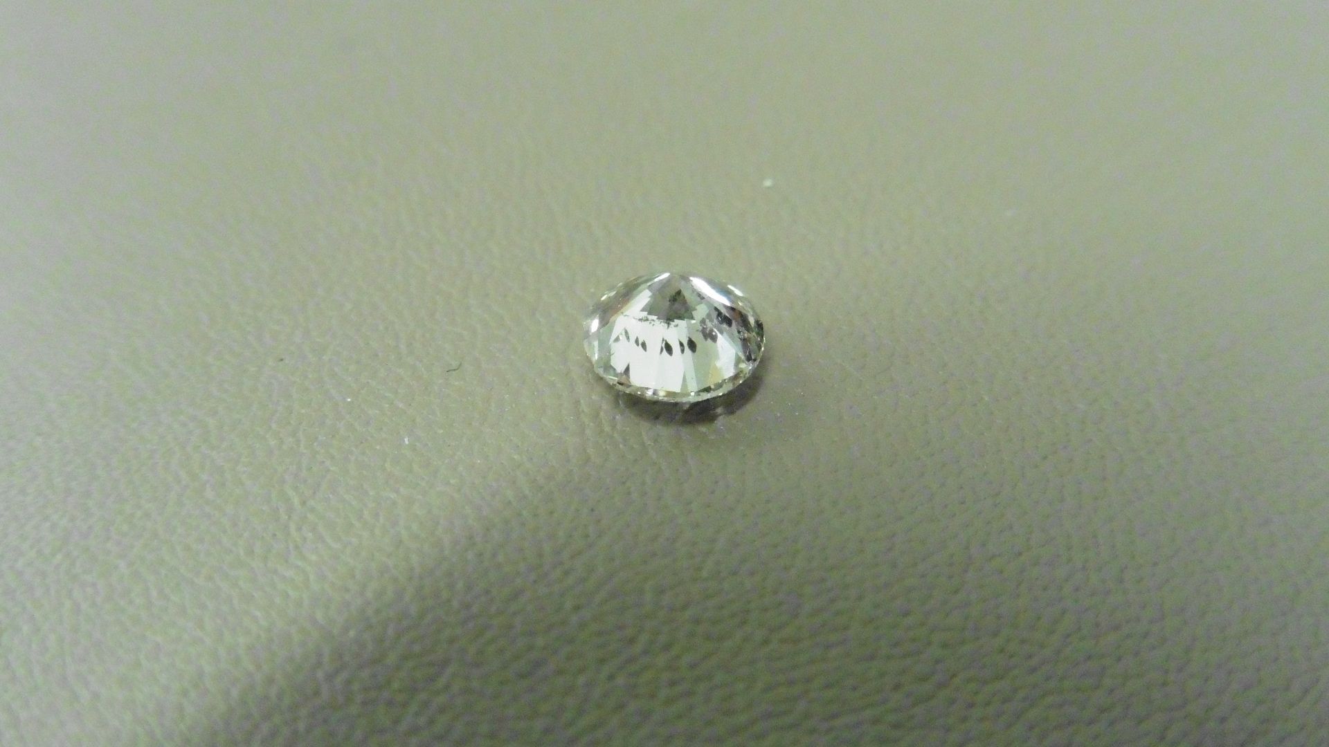 0.91ct brilliant cut diamond, loose stone.J colour and I1 clarity. 5.91 x 6 x 3.96mm. IGI - Image 2 of 5