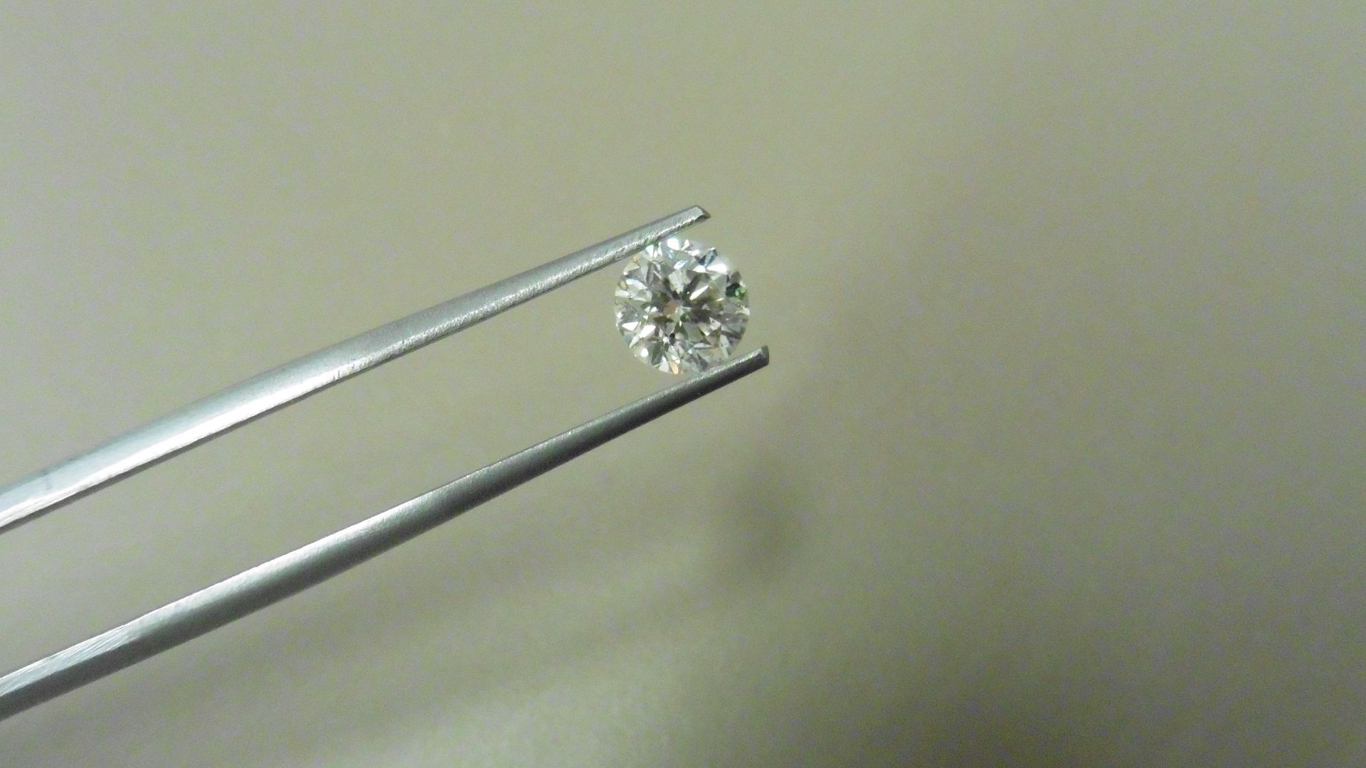 0.91ct brilliant cut diamond, loose stone.J colour and I1 clarity. 5.91 x 6 x 3.96mm. IGI - Image 4 of 5