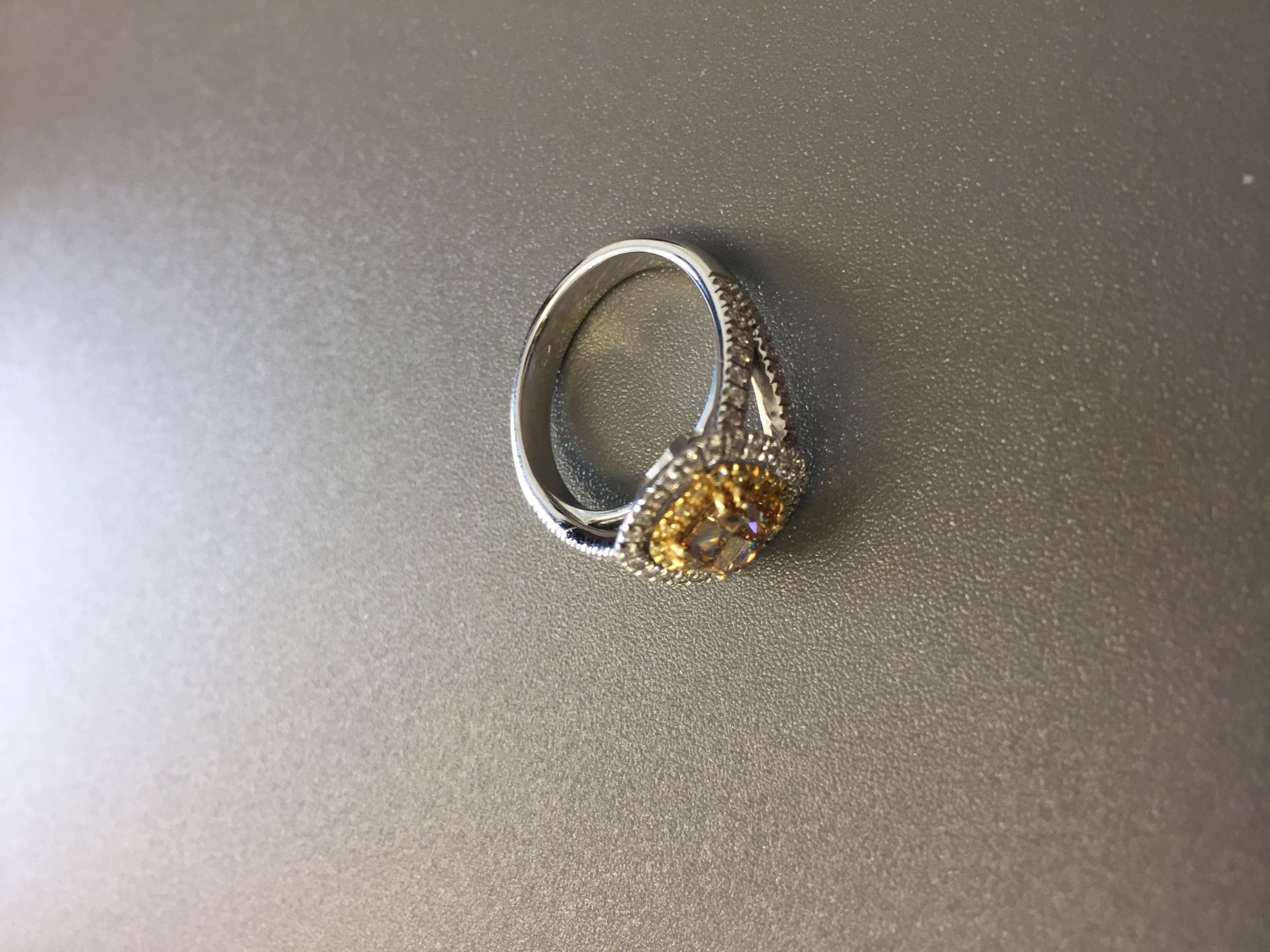 1.15ct diamond set solitaire ring with a yellow cushion cut yellow diamond and a halo setting and - Image 3 of 5