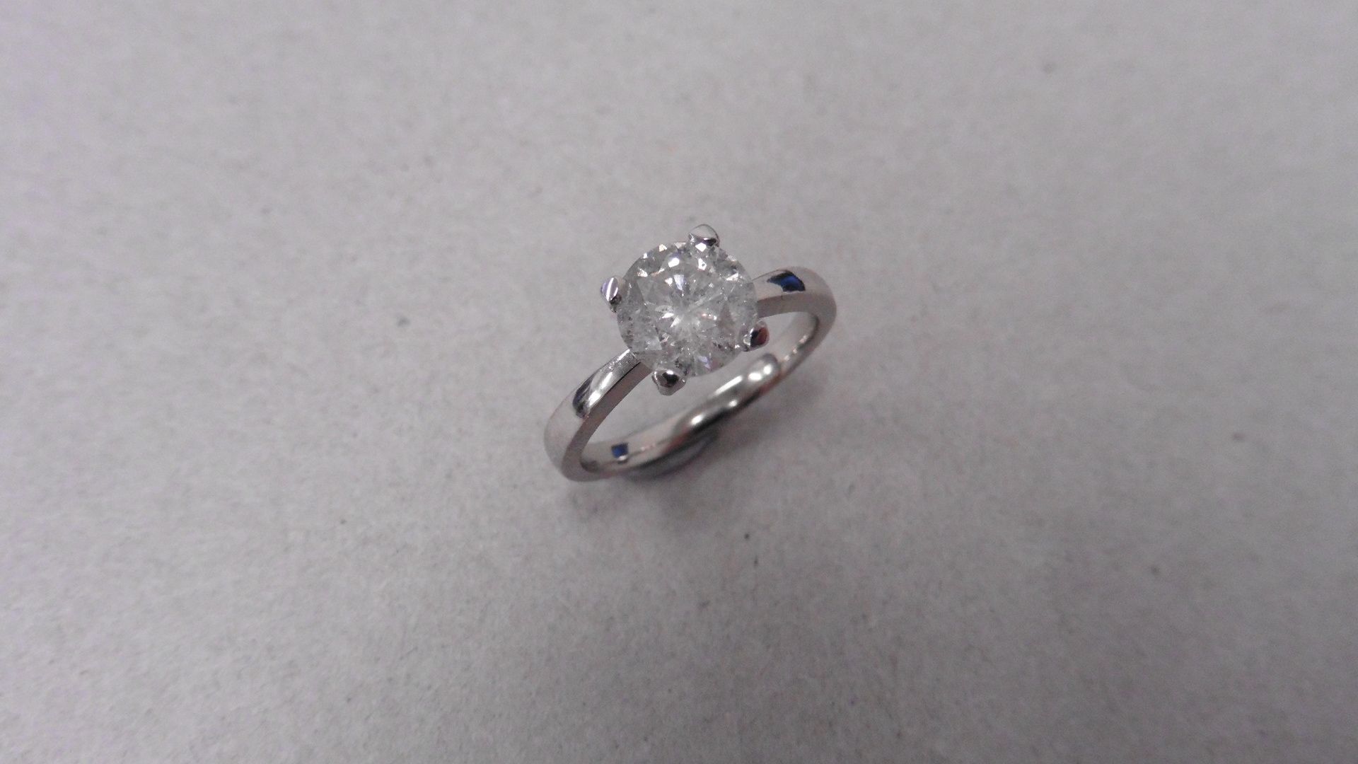1.50ct diamond solitaire ring set in platinum. Enchanced diamond, H colour and I2 clarity. 4 claw