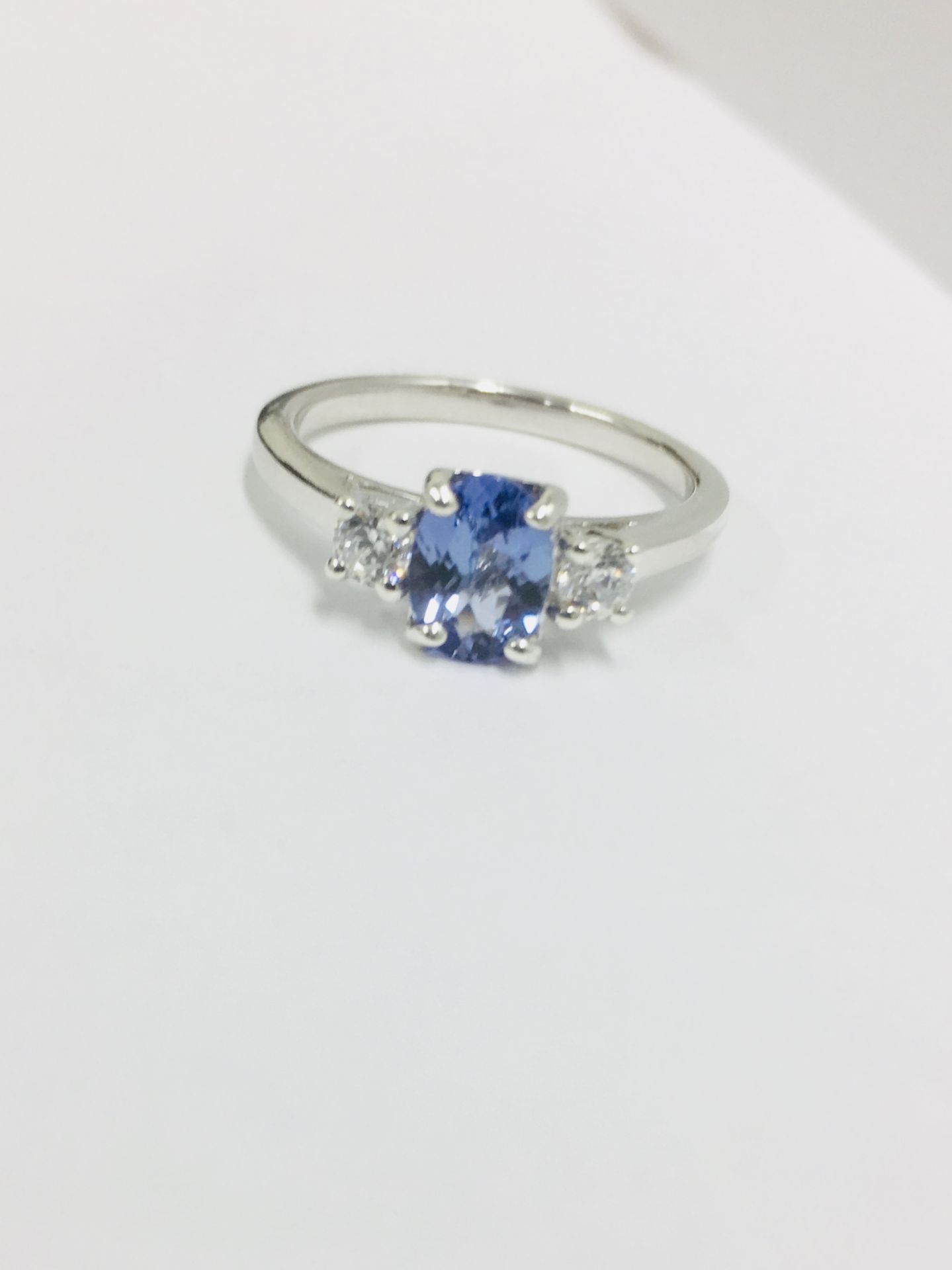 Platinum Sapphire Diamond three stone ring,7mmx5mm sapphire 1ct ,0.20ct diamonds (2x.10ct) h