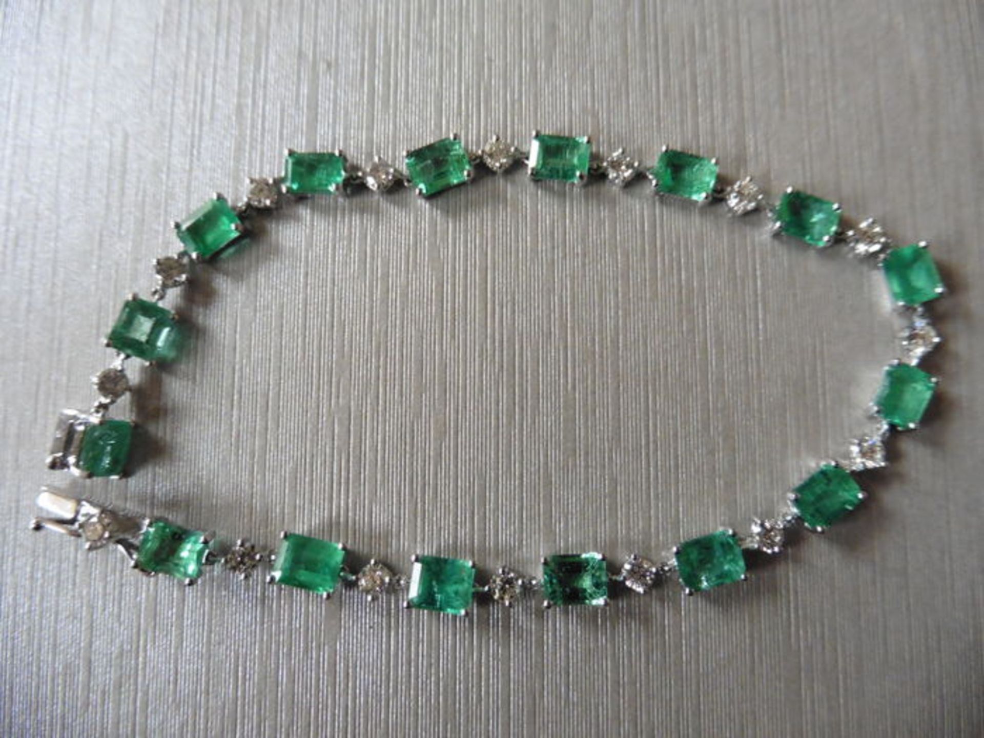 6ct emerald and diamond bracelet.Set with emerald cut ( treated ) emeralds and small brilliant cut
