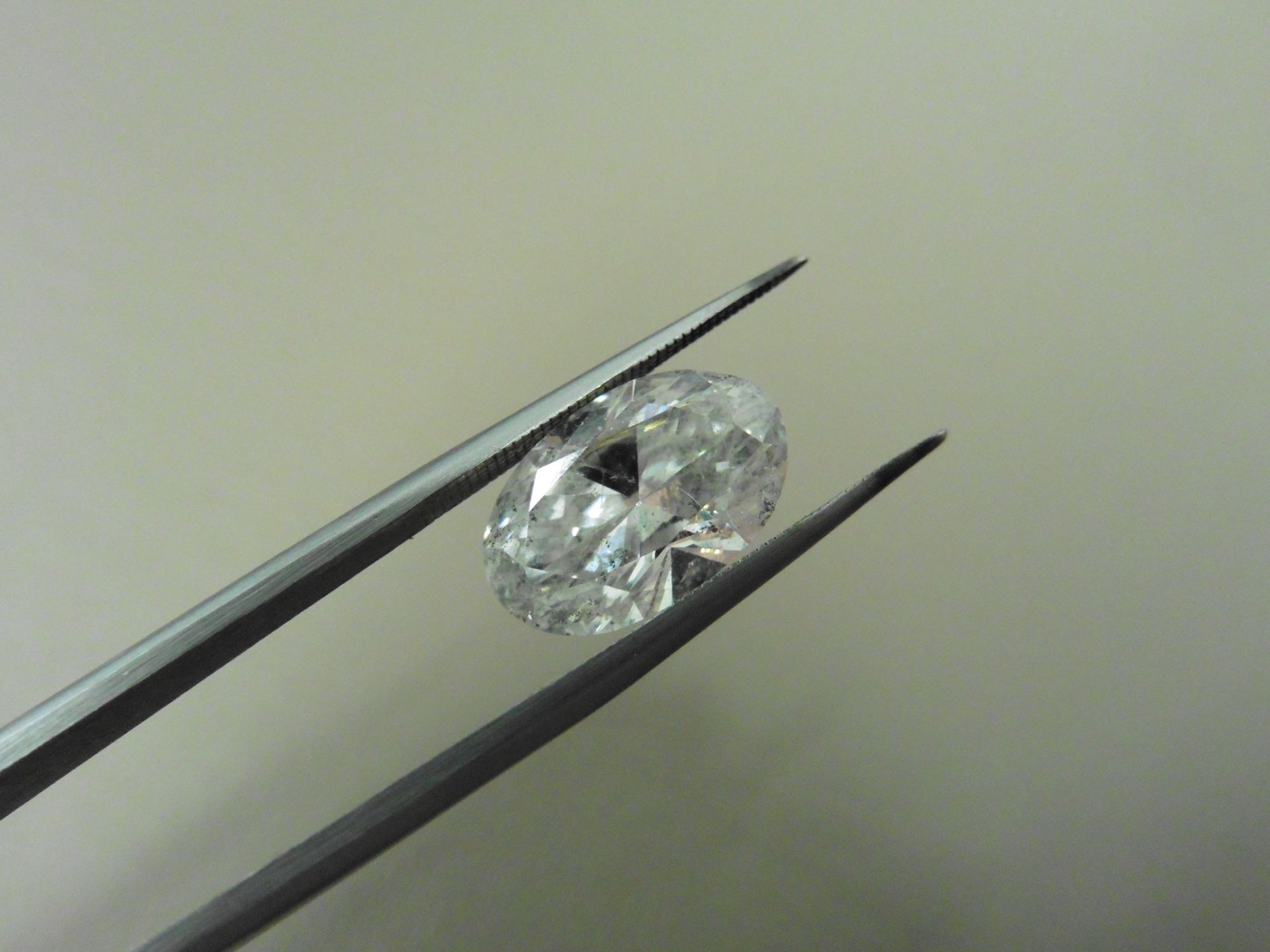 3.50ct enhanced oval cut diamond. F colour and I1 clarity ( clarity enhanced ).EGL certification.
