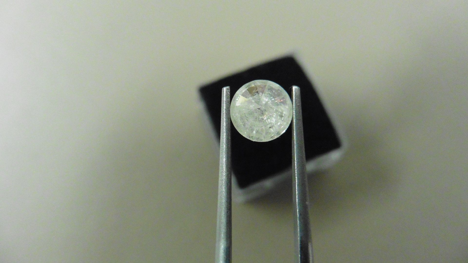 1.04ct Brilliant Cut Diamond, Enhanced stone. I colour, I2 clarity. 6.49 x 3.85mm. Valued at £ - Bild 2 aus 4