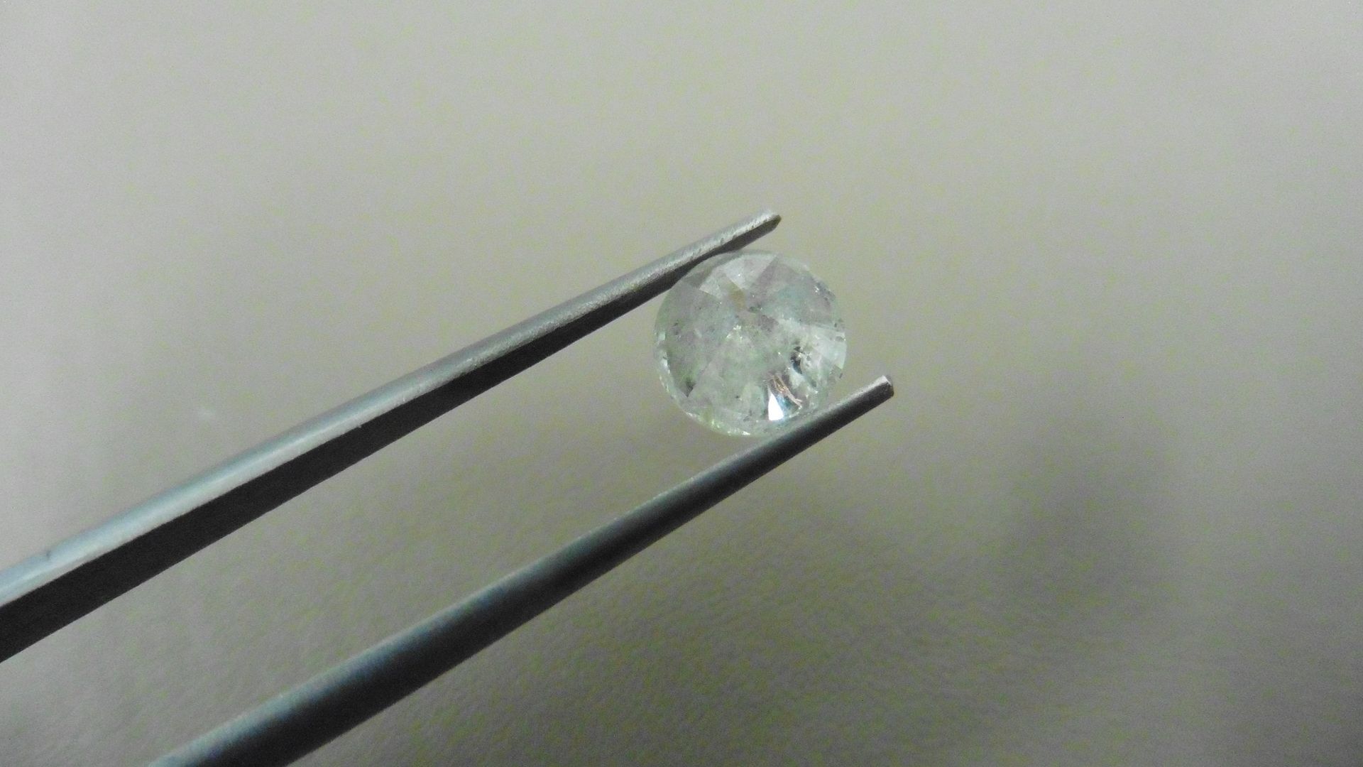 2.04ct Brilliant Cut Diamond, Enhanced stone. I colour, I2 clarity. 7.80 x 4.96mm. Valued at £ - Image 3 of 5