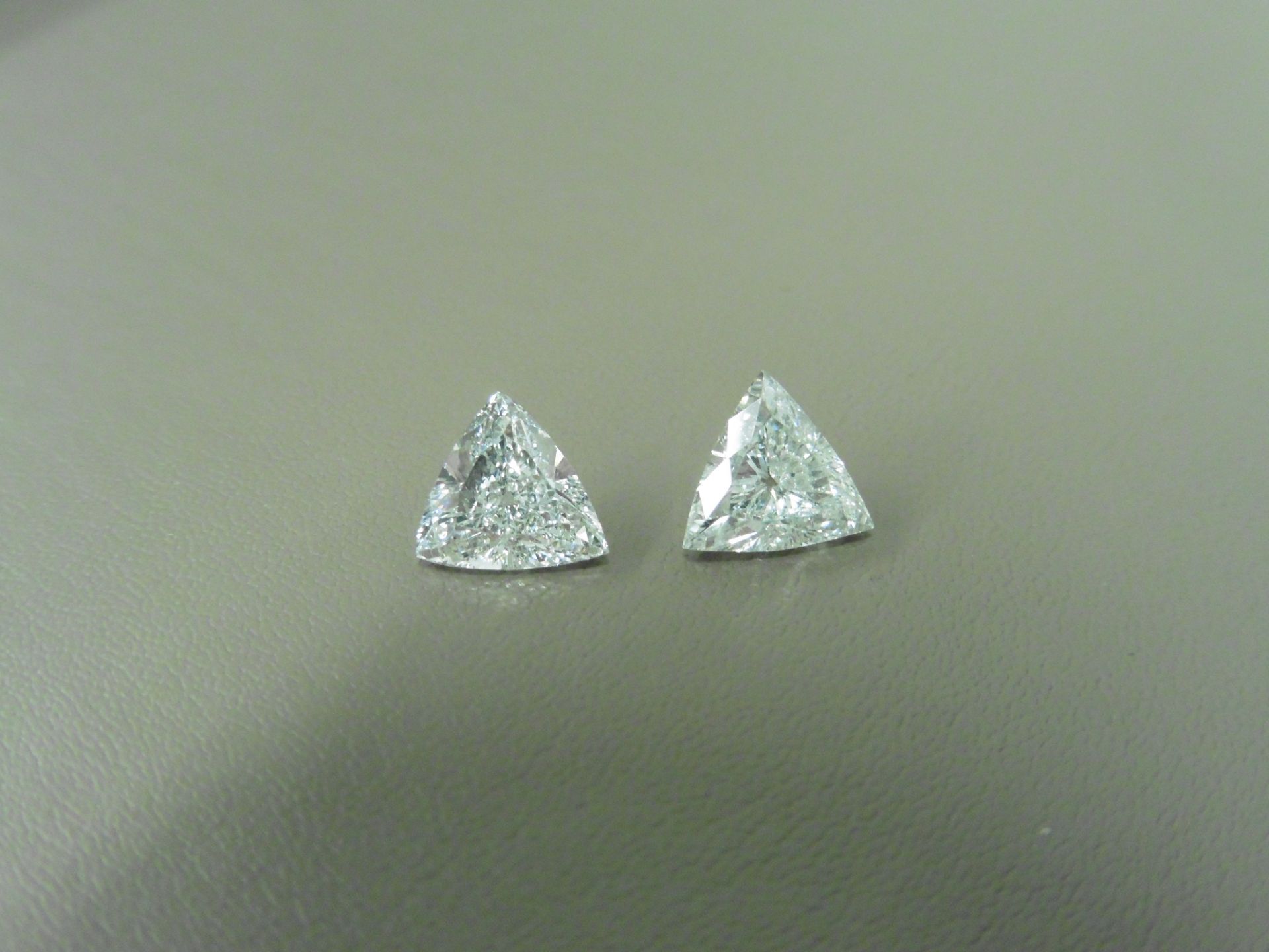 2.21ct natural loose pair of triangular diamonds. F colour and VS-SI clarity. EGL certificaton.